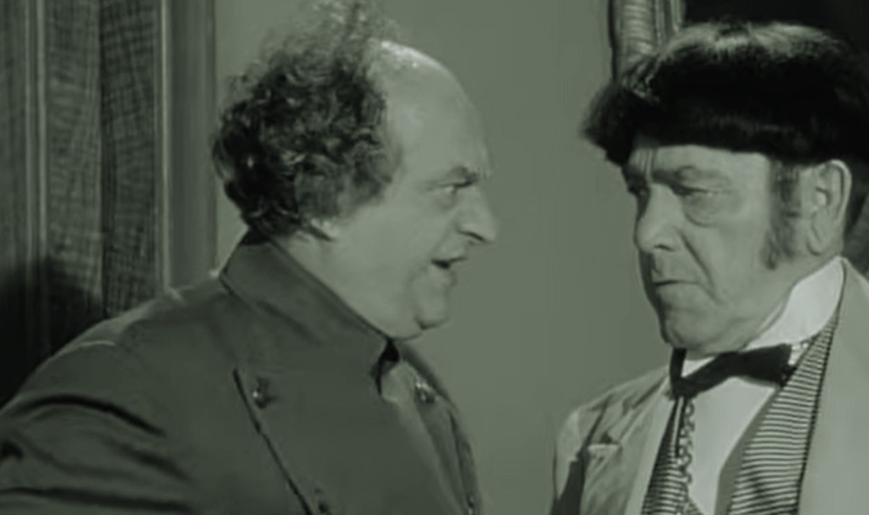 Screenshot from The Three Stooges Go Around the World in a Daze (1963)
