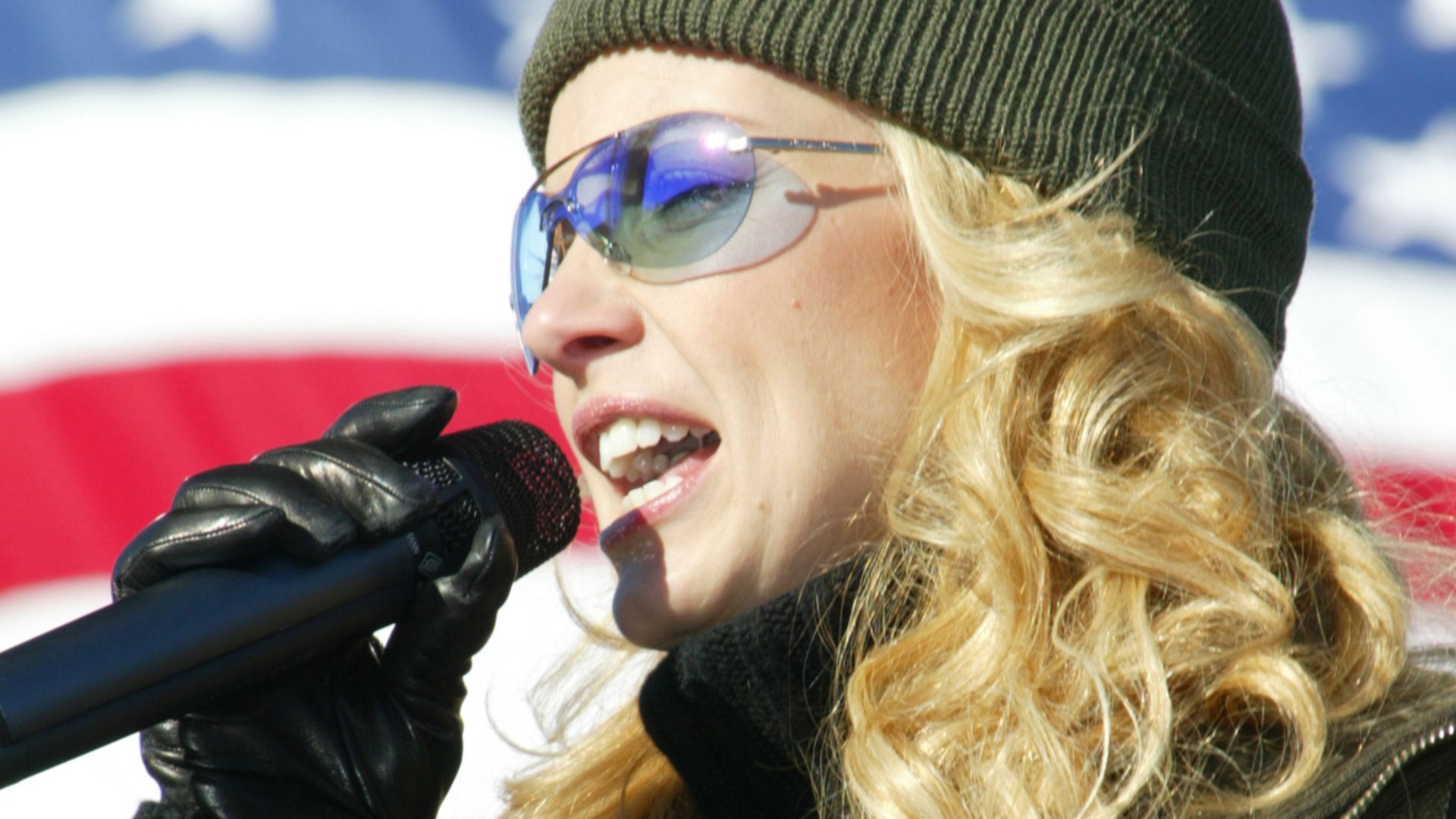 Faith Hill sings during a free concert she performed for people from here and nearby Pope Air Force Base on Feb. 13. The three-time Grammy Award-winning country musician performed a live five-song concert as a tribute to America's armed forces and as part