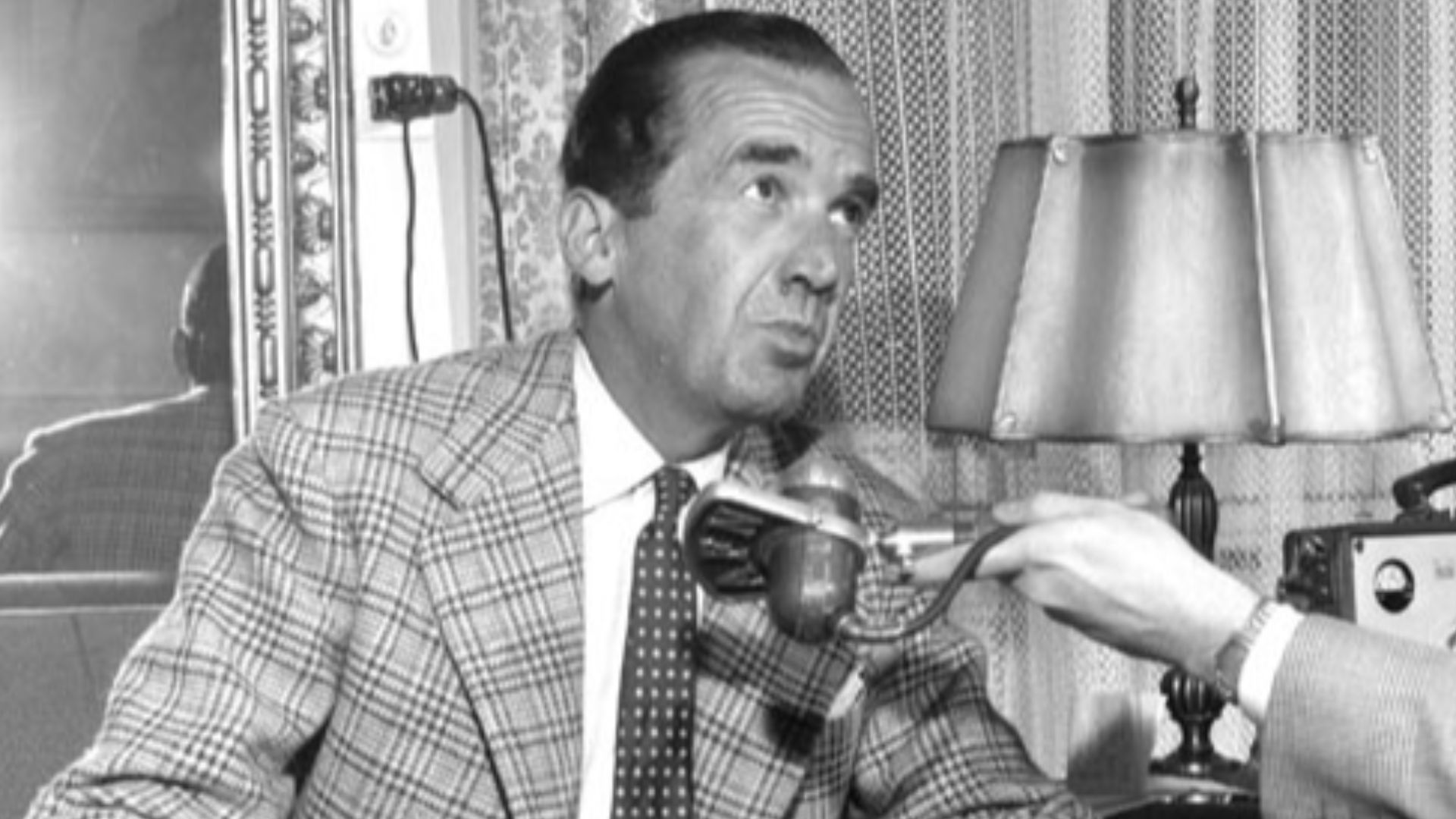 Wiesbaden, Germany, April 8, 1956: CBS newsman Edward R. Murrow is on the other end of the microphone this time as he talks to reporters during a stop in Wiesbaden, where he received a USAFE briefing before moving on to Tripoli to begin gathering material