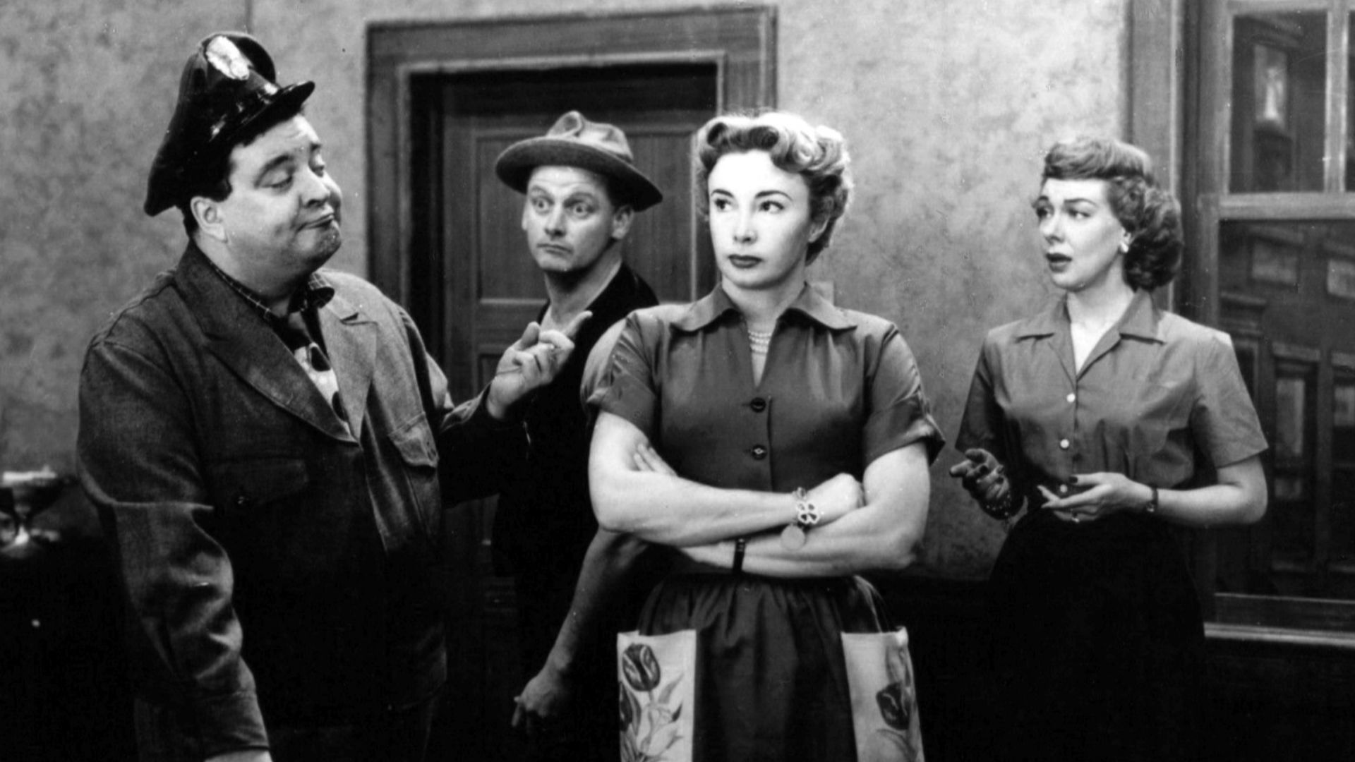 Photo of the full cast of The Honeymooners.  From left-Jackie Gleason (Ralph Kramden), Art Carney (Ed Norton), Audrey Meadows (Alice Kramden), Joyce Randolph (Trixie Norton).