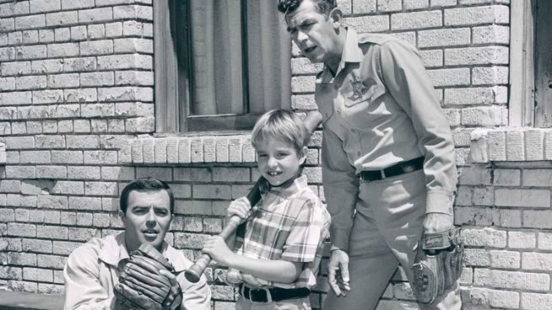 Publicity photo from the television program Mayberry R.F.D.  Pictured are Ken Berry (Sam Jones), Buddy Foster (Mike Jones), and Andy Griffith (Sheriff Andy Taylor).