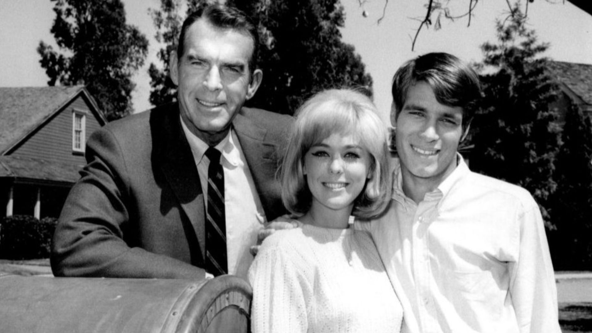 Photo of Fred MacMurray as Steve Douglas, Tina Cole as Katie Miller and Don Grady as Robbie Douglas from the television program My Three Sons.  When the Douglas family moves to California, Robbie changes colleges and meets a girl there he is very attracte