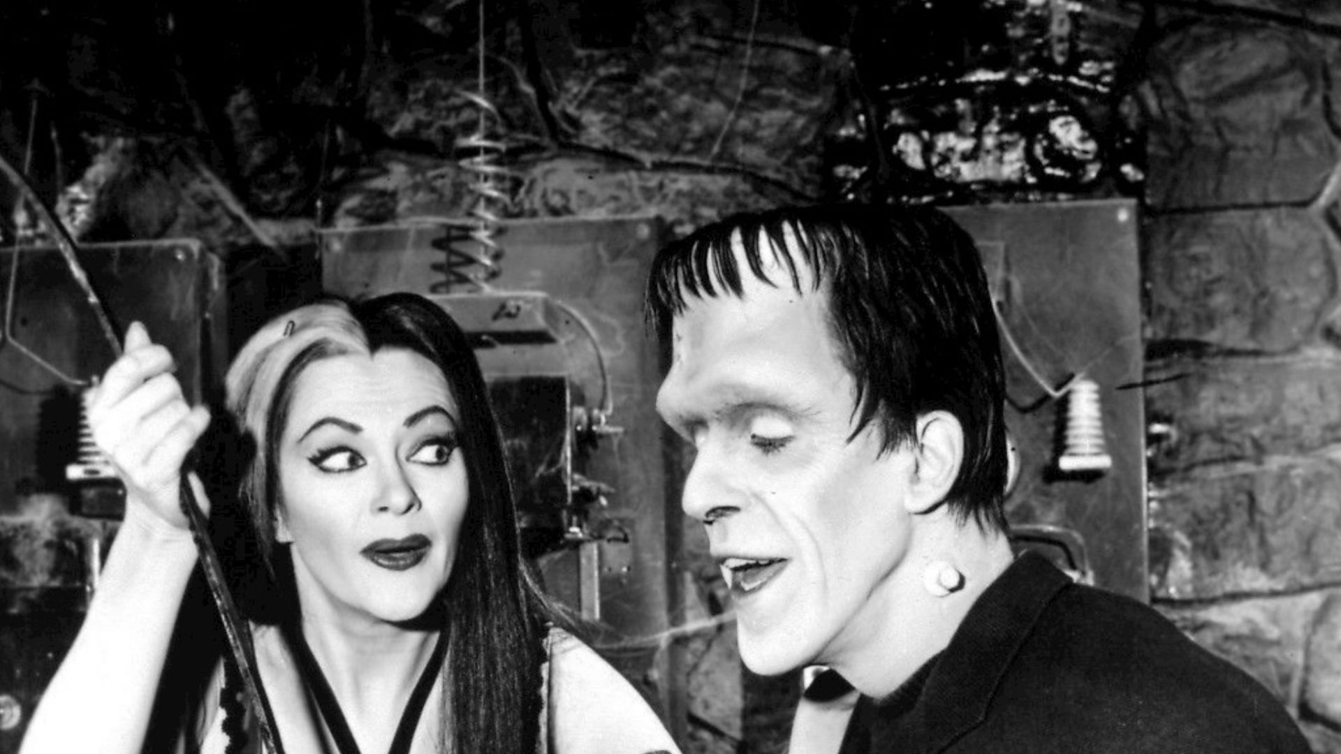 Photo of Lily and Herman Munster.