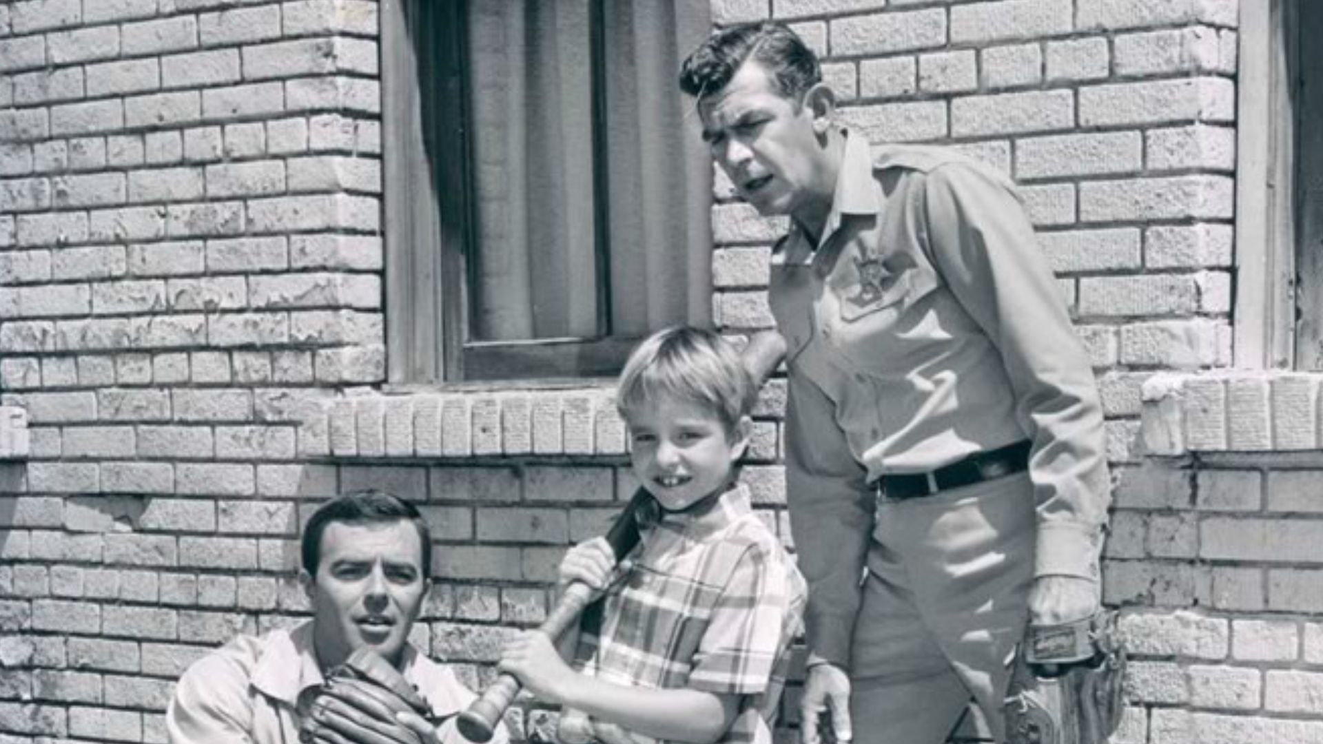 Publicity photo from the television program Mayberry R.F.D.  Pictured are Ken Berry (Sam Jones), Buddy Foster (Mike Jones), and Andy Griffith (Sheriff Andy Taylor).