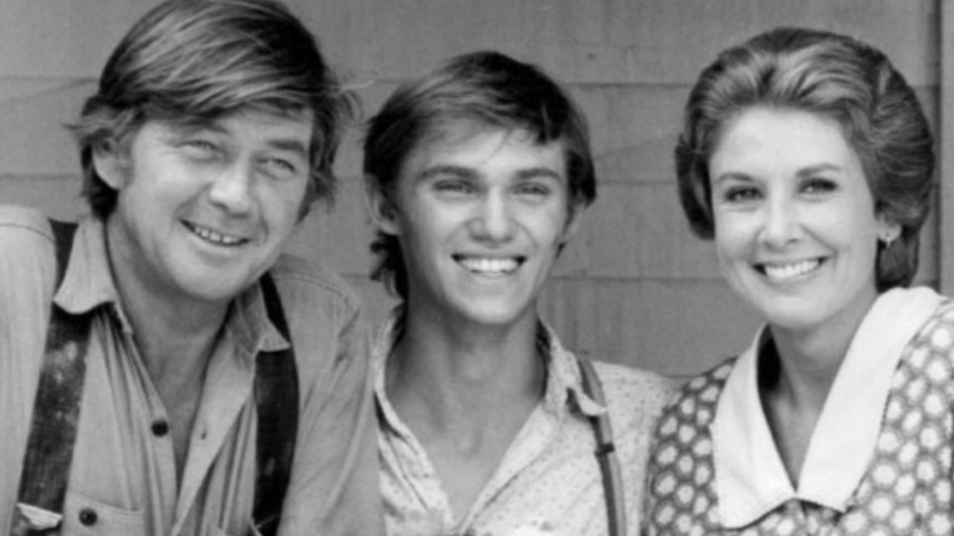 Publicity photo of Ralph Waite (John Walton, Sr.), Richard Thomas (John Boy), and Michael Learned (Olivia Walton) from the television program The Waltons.