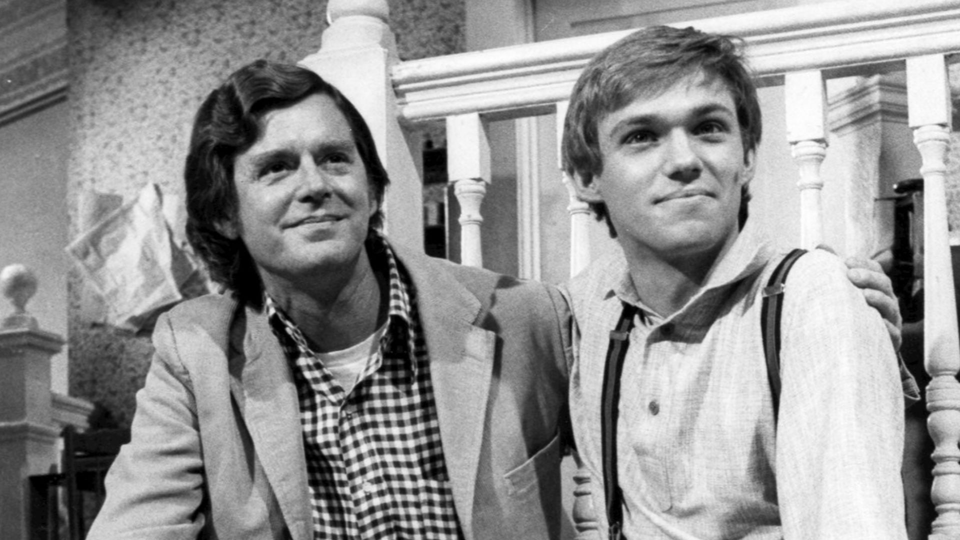 Photo of Earl Hamner, author, and Richard Thomas on the set of the television show The Waltons.