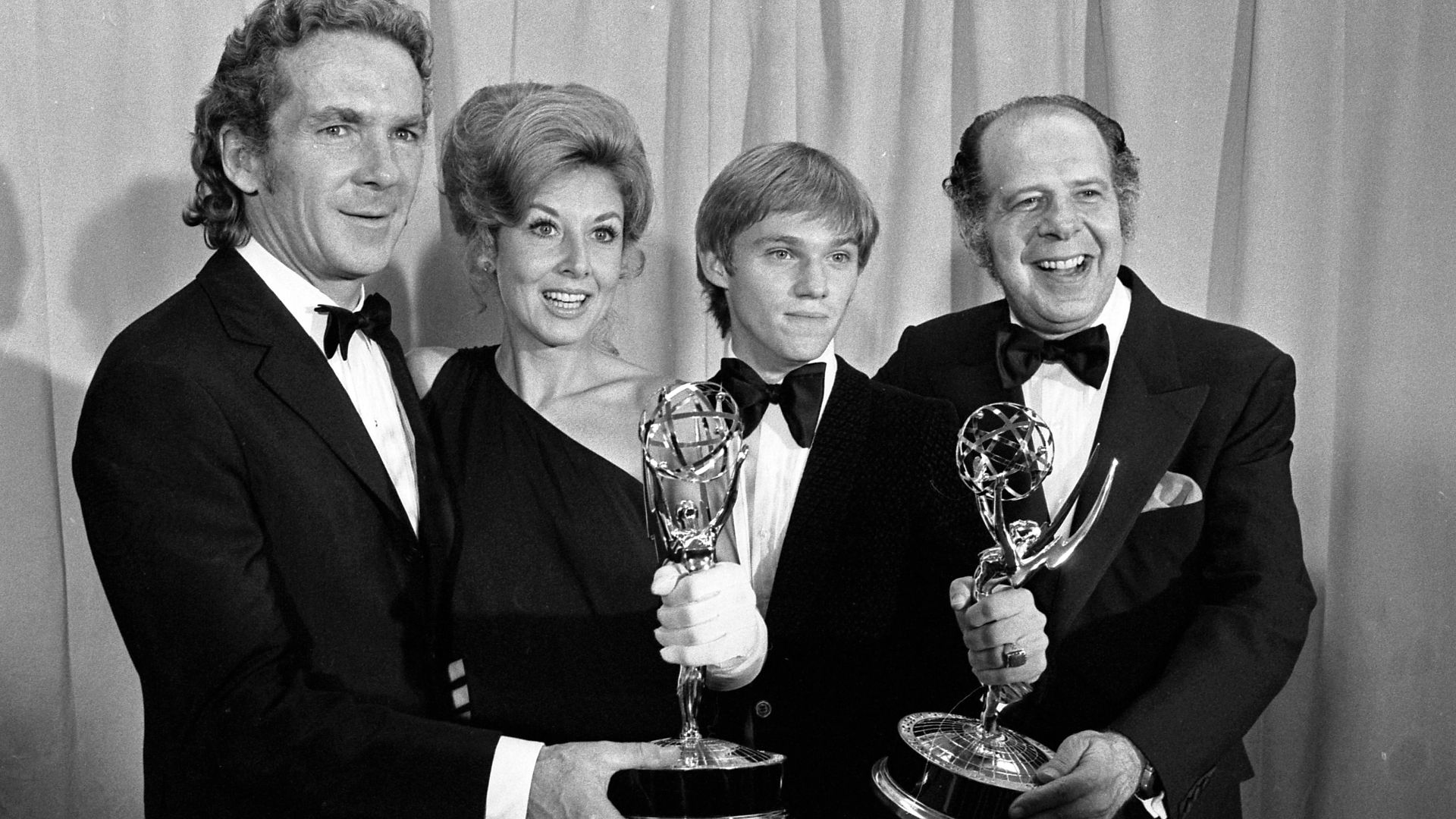 SERIES A WINNER—It was a night for The Waltons at Emmy awards show. The story about a depression family in the Blue Ridge Mountains was named best drama series and its stars were named the best actress and actor. From left, producer Robert L. Jacks, stars