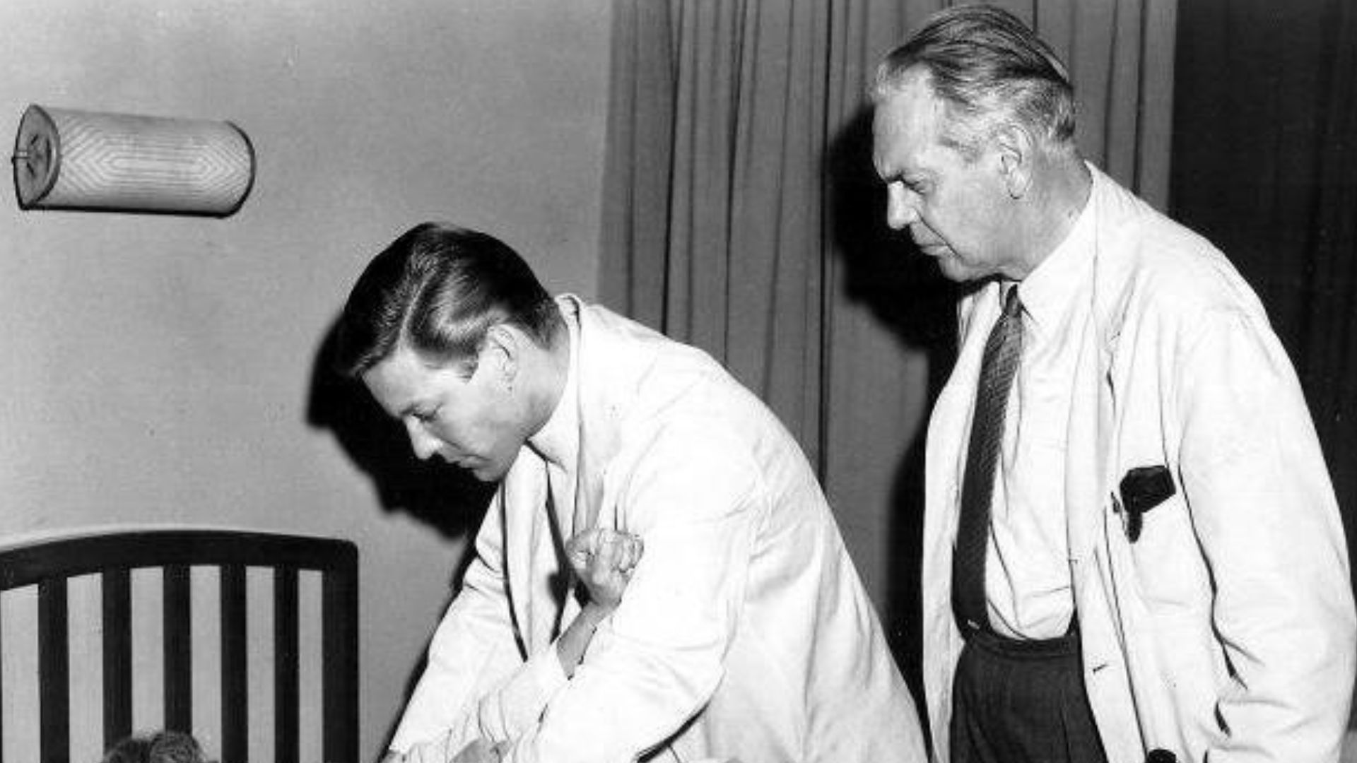 Photo from the first episode of the television program Dr. Kildare.  Beverly Garland is the patient Kildare (Richard Chamberlain) is having difficulty with while Dr. Gillespie (Raymond Massey) tries to help.