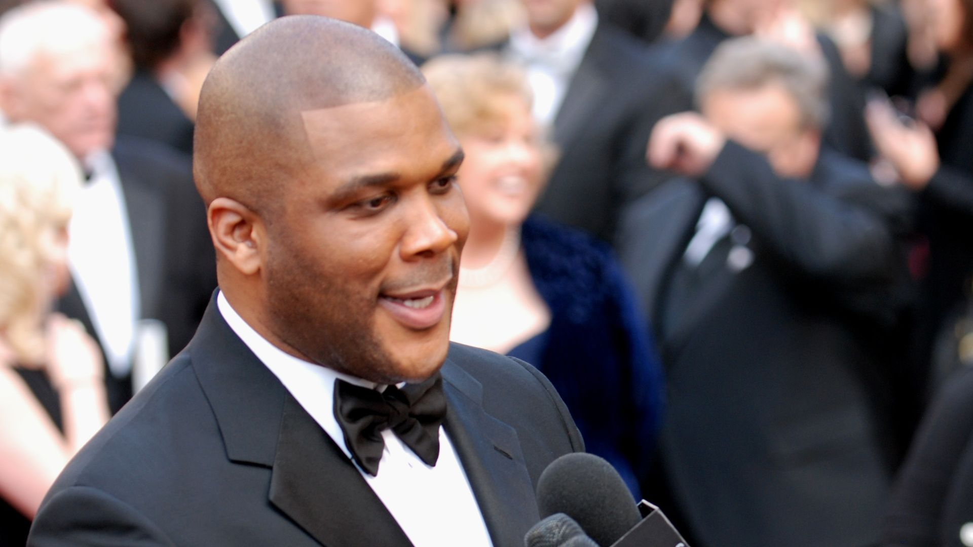 Tyler Perry mixes it up with the media on the red carpet at the 82nd Academy Awards.