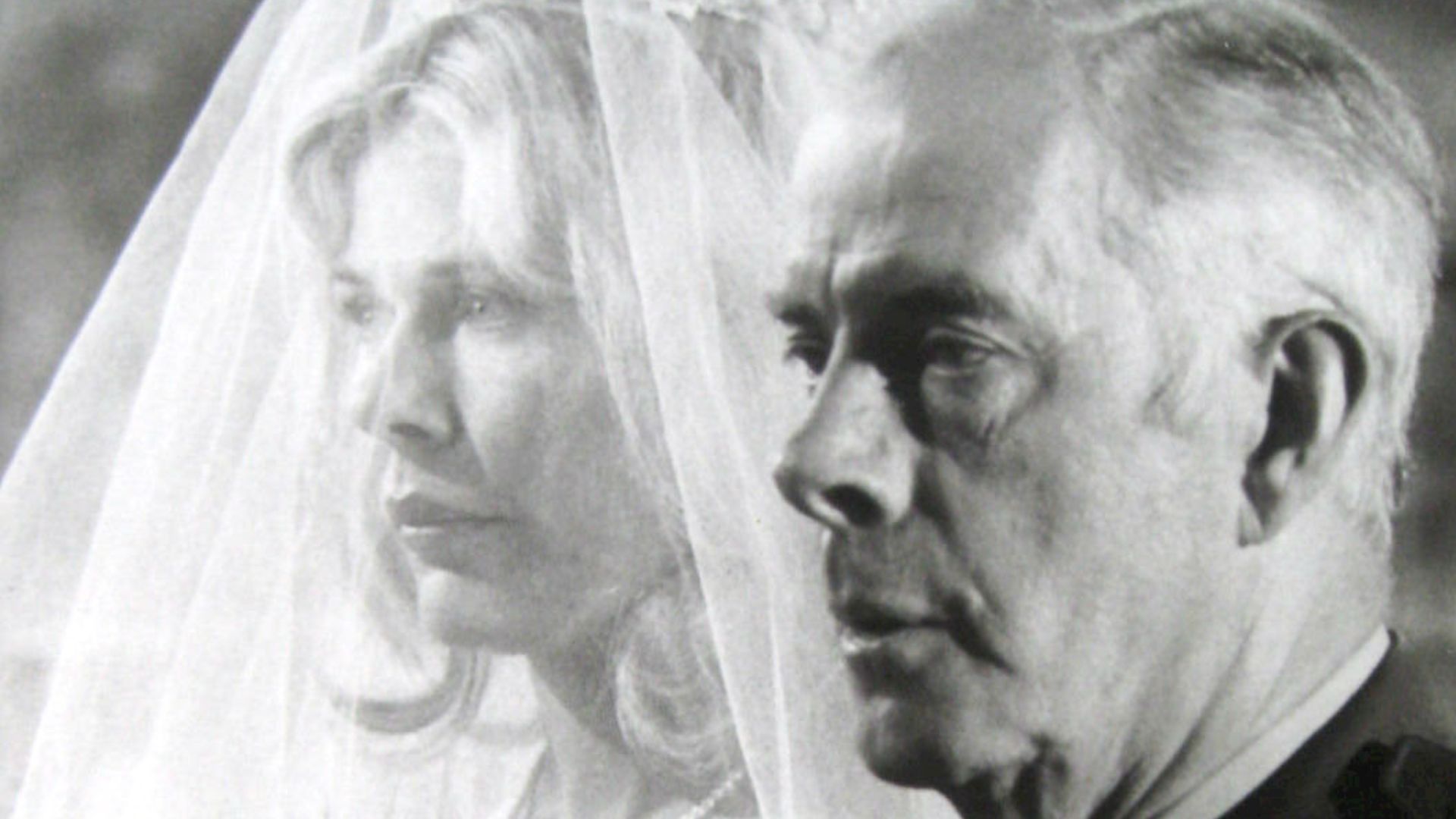 Photo of Loretta Swit as Margaret Houlihan and Harry Morgan as Colonel Sherman Potter from the television series M*A*S*H.  The colonel is giving the bride away.