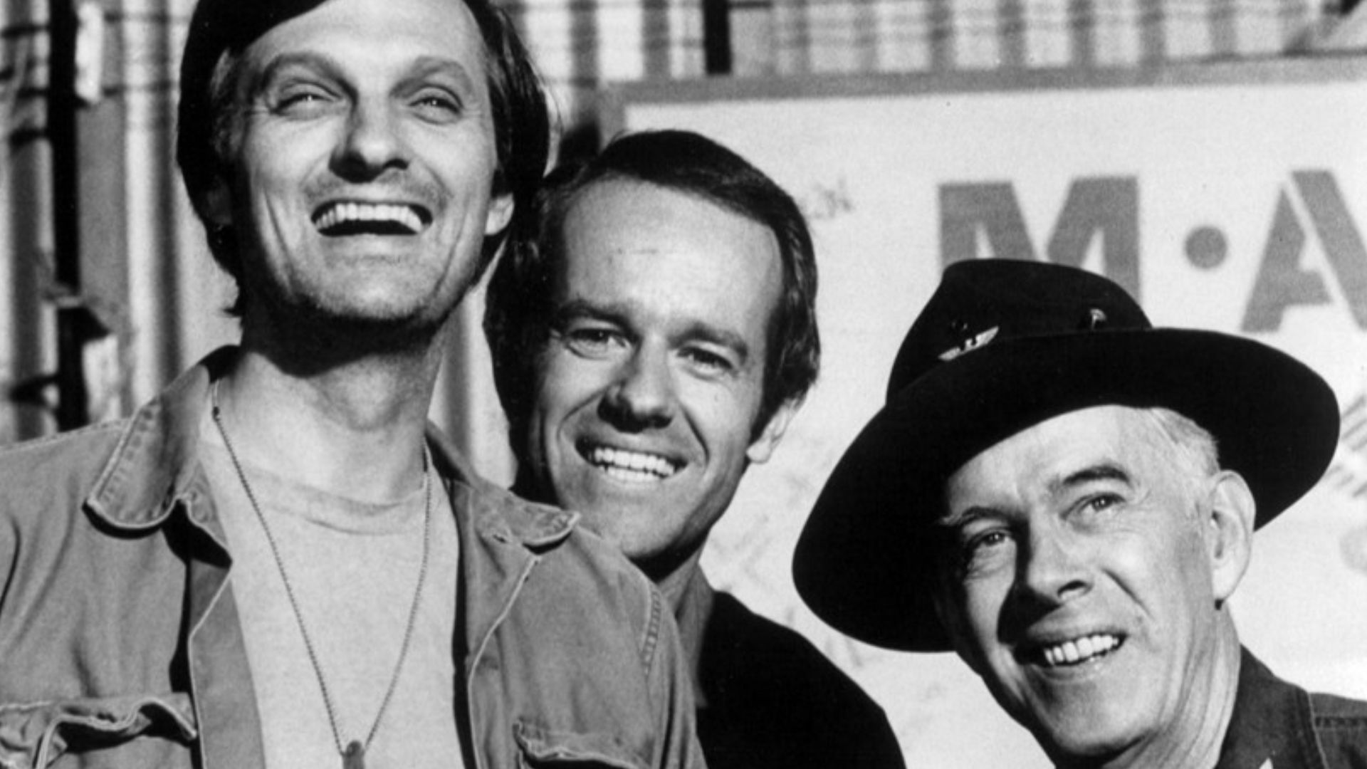 Publicity photo of some M*A*S*H cast members for 1975-Alan Alda, Mike Farrell and Harry Morgan. This season Morgan joined the show as Colonel Potter.