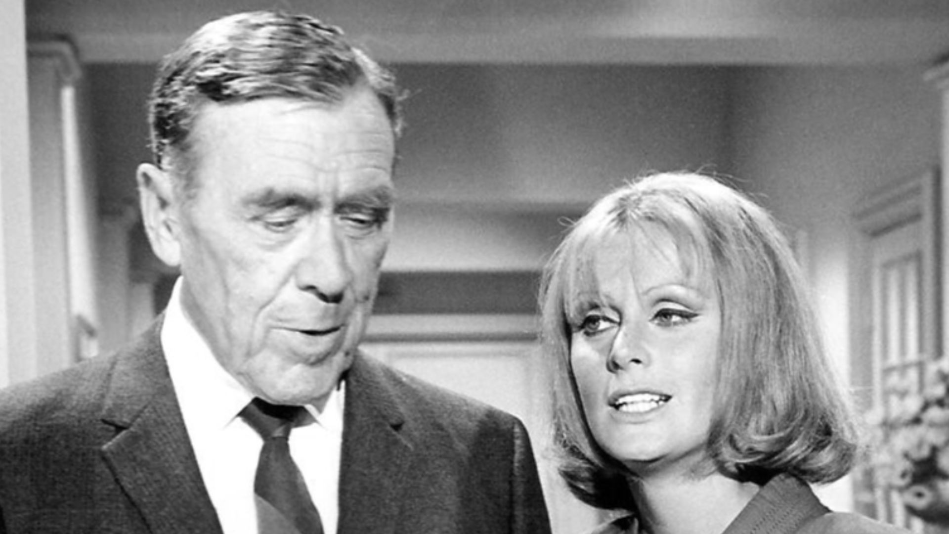 Photo of Leo G. Carroll as Alexander Waverly and guest star Diana Hyland from the television program The Man From U.N.C.L.E..  The episode is