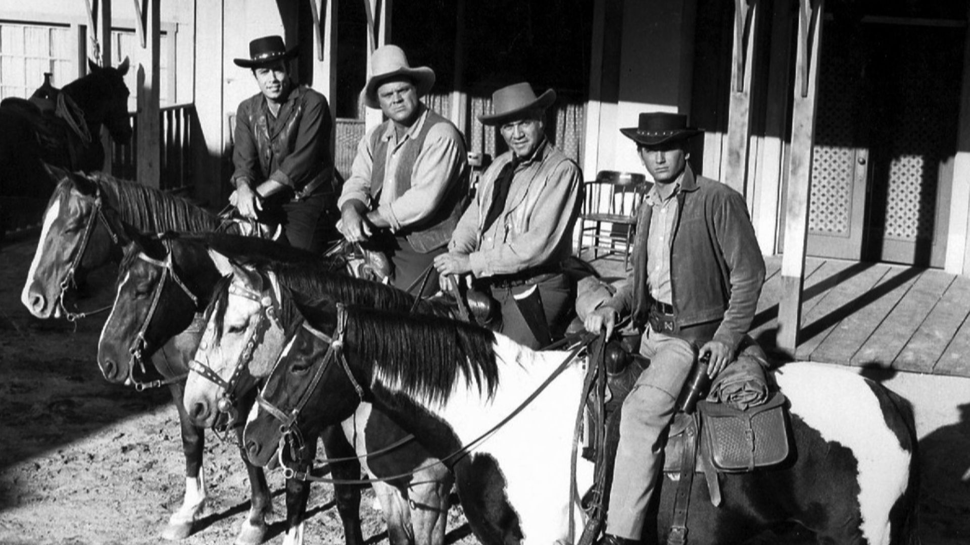 Photo of the main cast of Bonanza.  From left-Pernell Roberts (Adam), Dan Blocker (Hoss), Lorne Greene (Ben), Michael Landon (Little Joe).