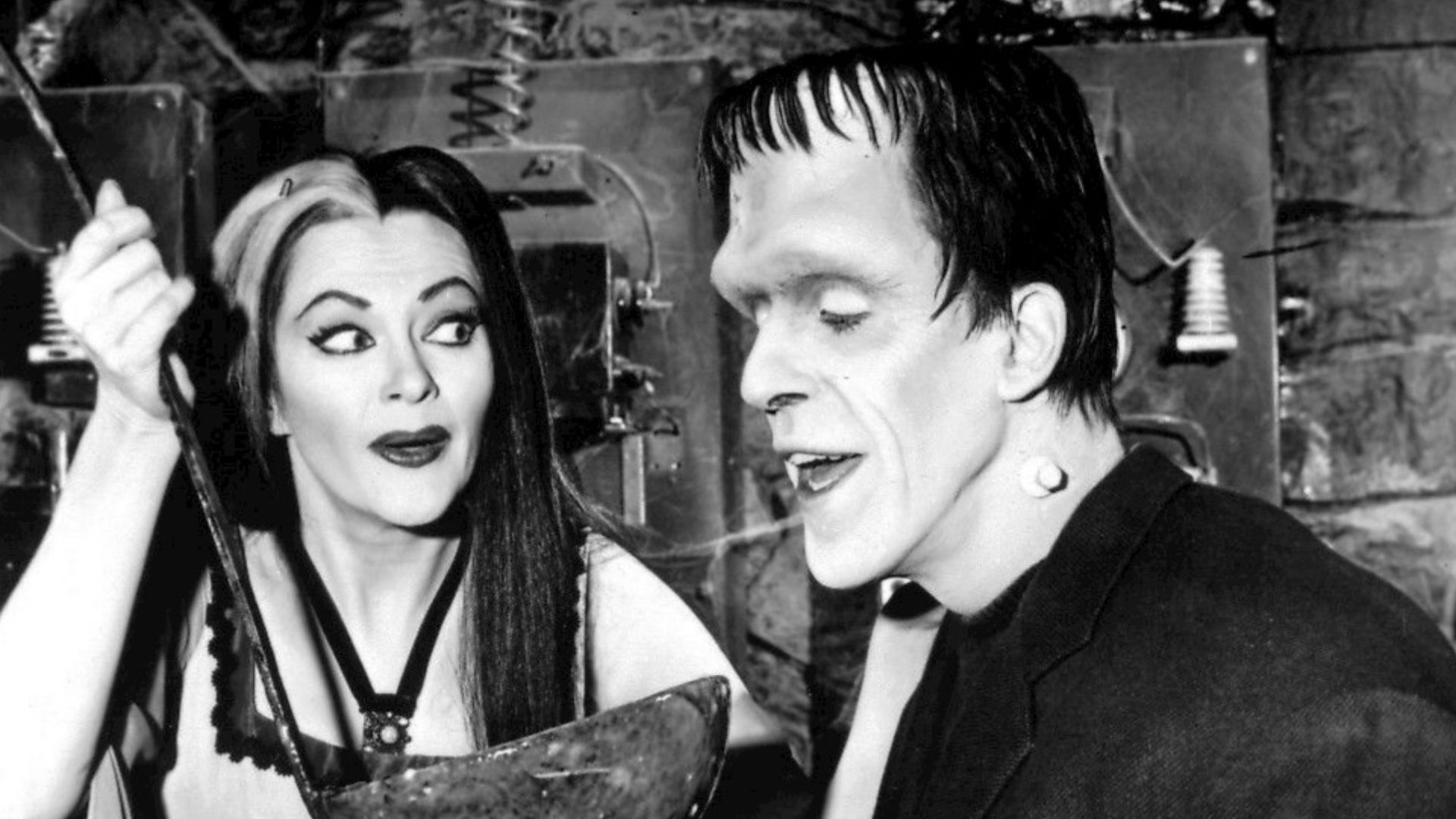 Photo of Lily and Herman Munster.