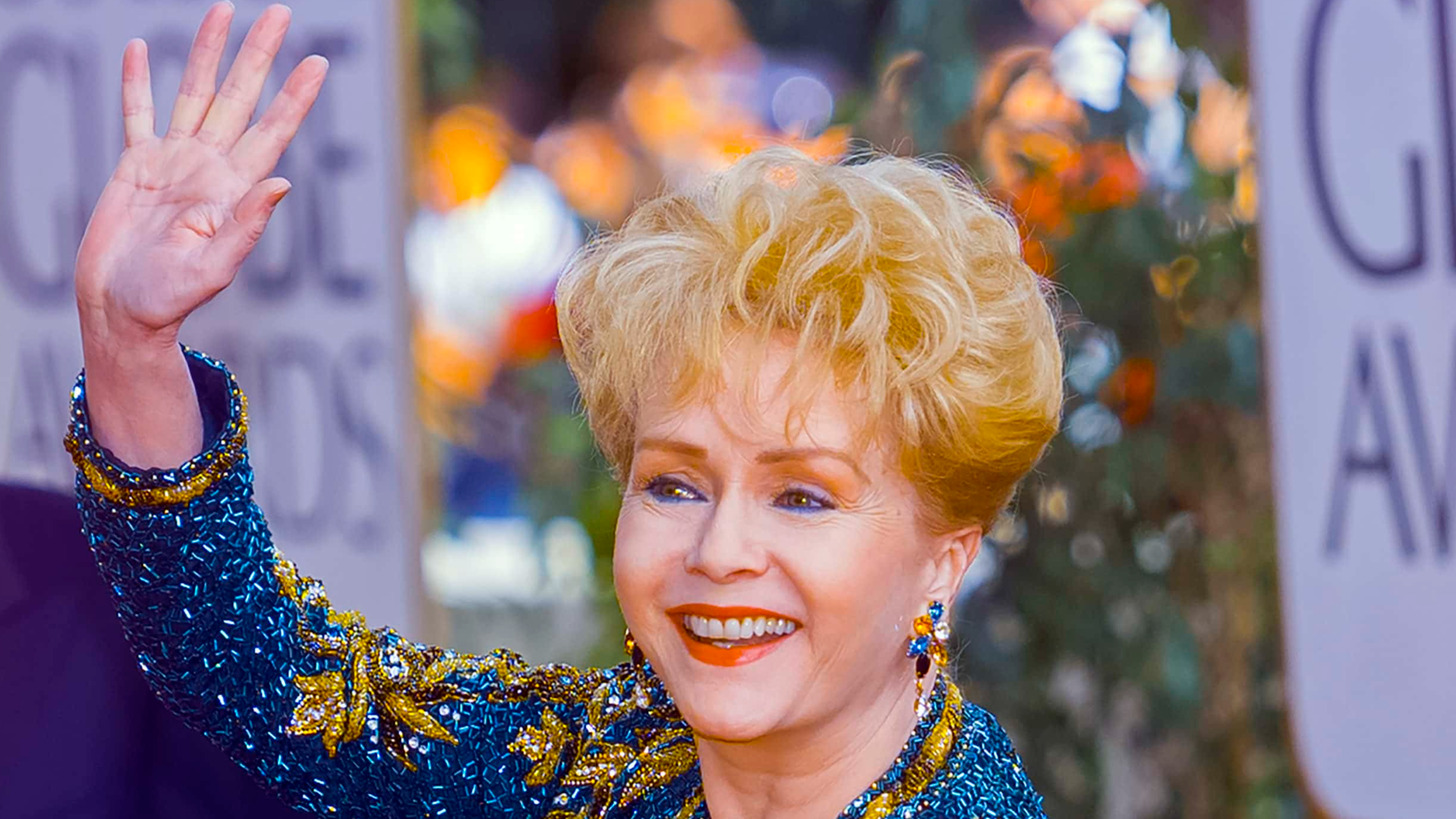 BEVERLY HILLS, CALIFORNIA - JANUARY 19: Debbie Reynolds and son Todd Fischer arrive at Golden Globe Awards Show, January 19, 1997 in Beverly Hills, California.