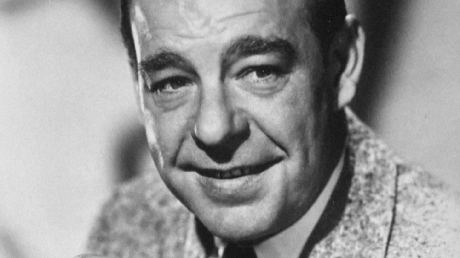 This is a publicity photo, circulated for publicity, of Lon Chaney Jr., published in 1950 without copyright notice, qualifying it under public domain.