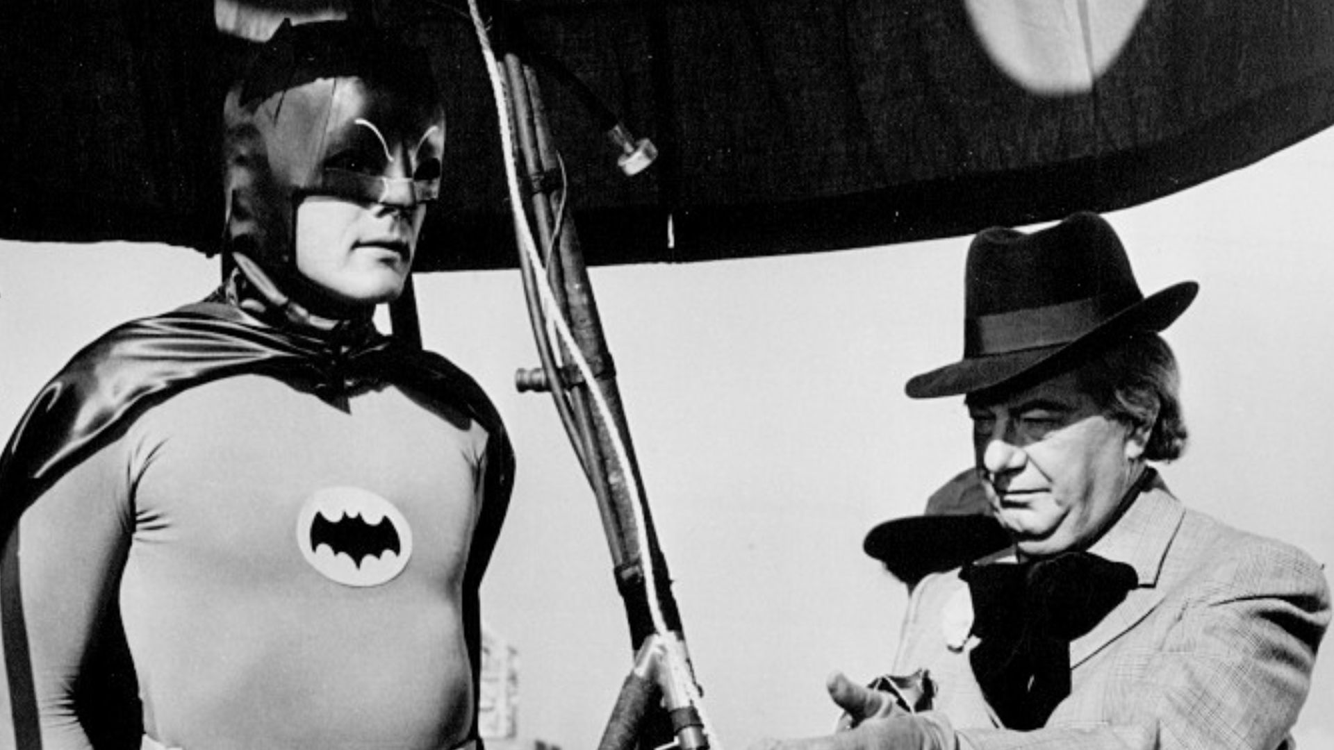 Photo of Burt Ward as Robin, Adam West as Batman and Maurice Evans as The Puzzler from the television series Batman.  This episode is