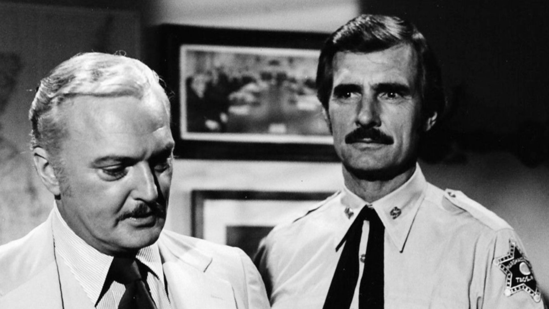 Photo of guest star Jack Cassidy and Dennis Weaver as Sam McCloud from the television series McCloud.