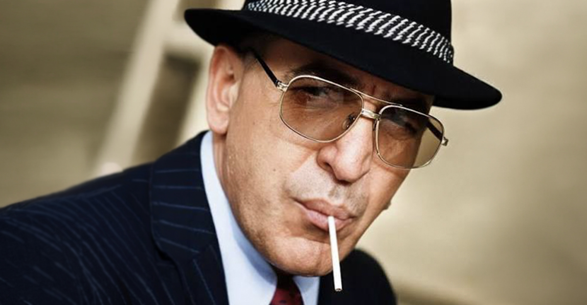 Telly Savalas as Kojak
