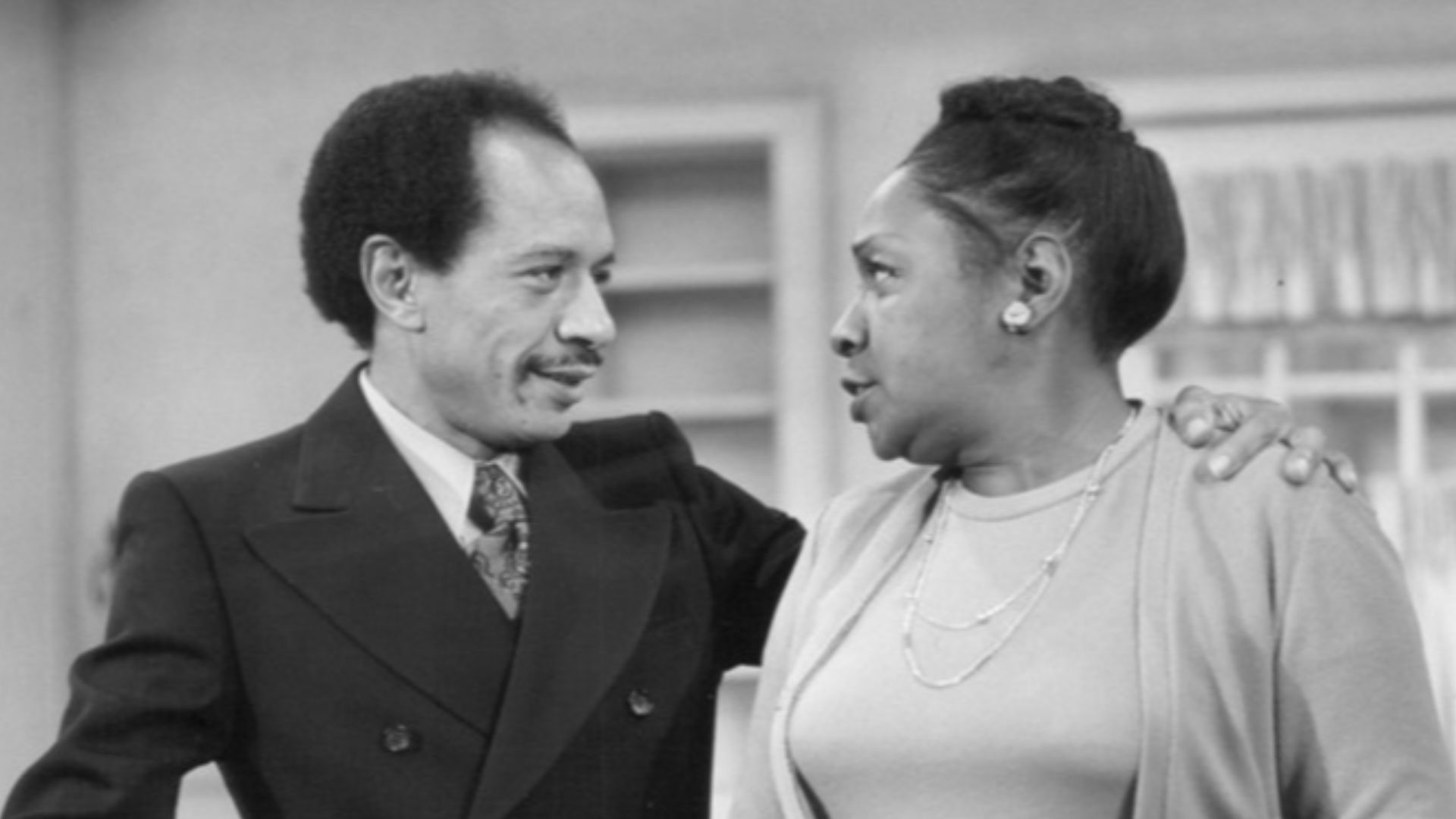 Publicity photo from  All in the Family. Pictured are Sherman Helmsley (George Jefferson) and Isabel Sanford (Louise Jefferson) as they pack to move from Queens to Manhattan. This began the television series The Jeffersons.