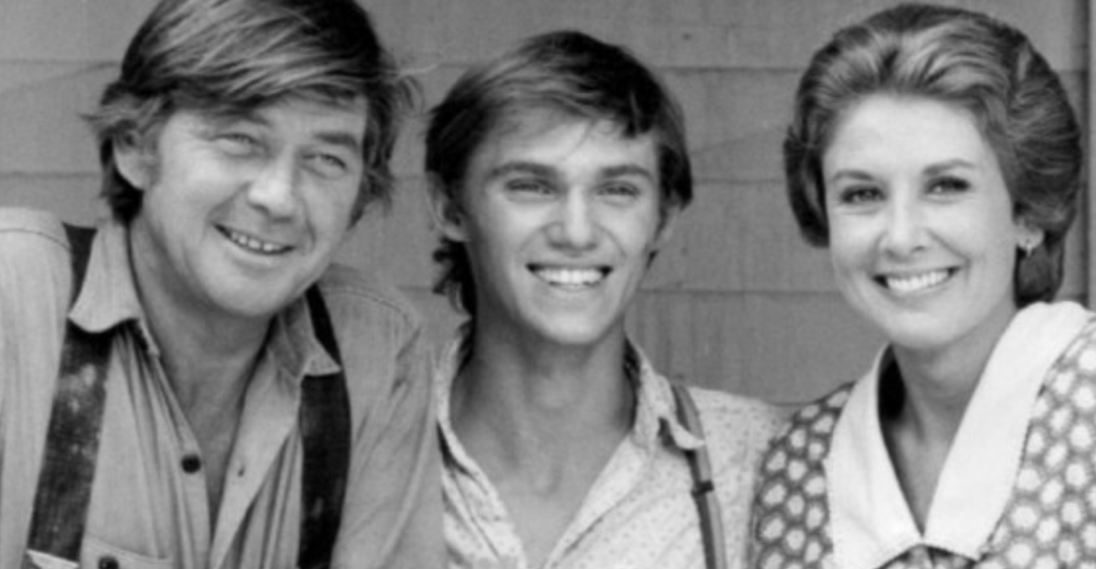 Publicity photo of Ralph Waite (John Walton, Sr.), Richard Thomas (John Boy), and Michael Learned (Olivia Walton) from the television program The Waltons.