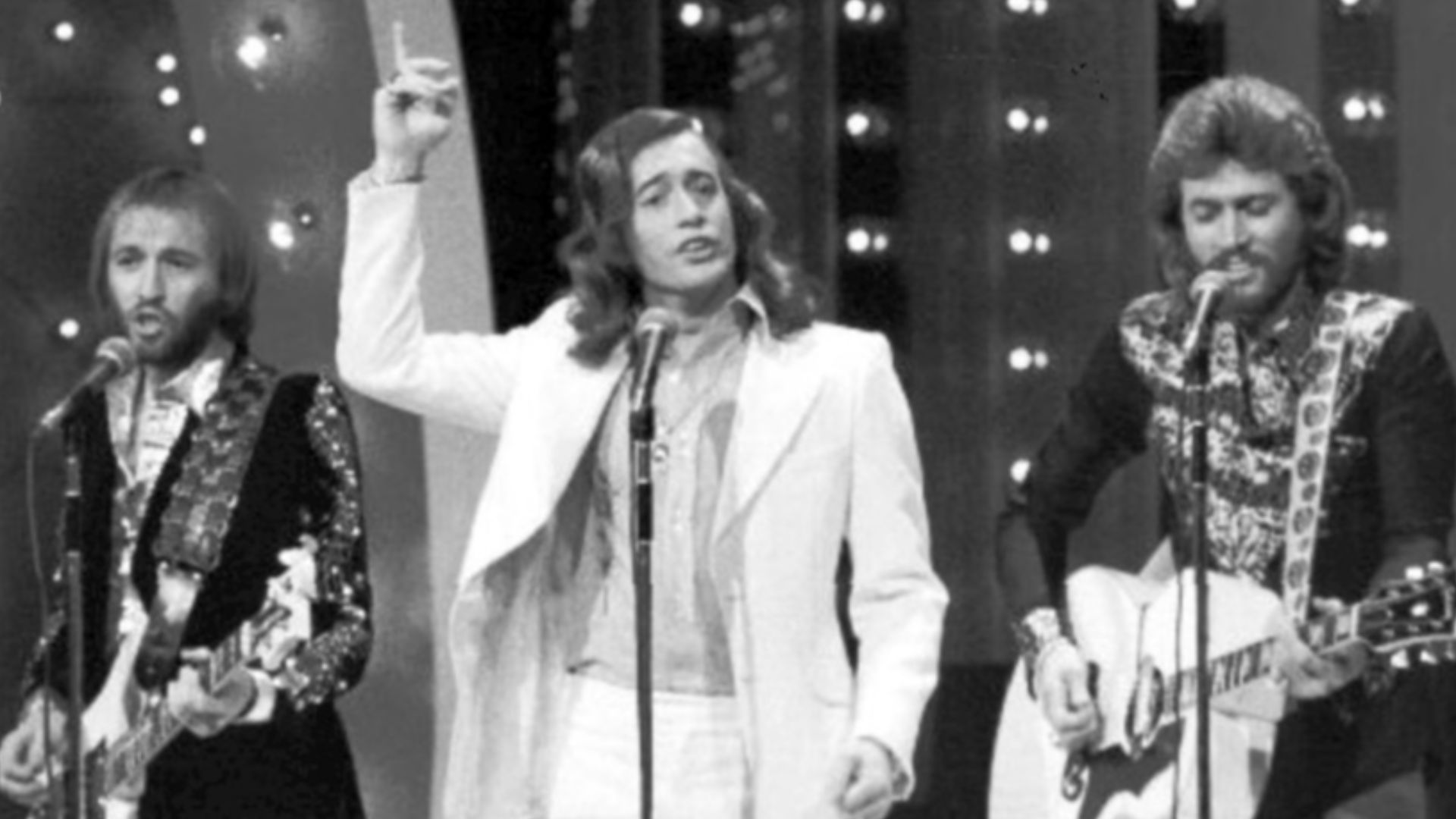Photo of the Bee Gees performing on the television program The Midnight Special.