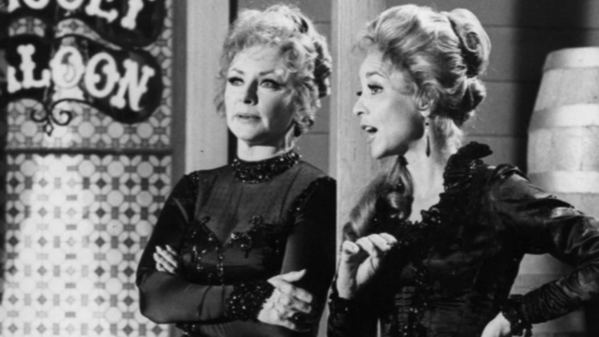 Photo from the television program Gunsmoke.  Pictured are Amanda Blake (left) and Beverly Garland.  In this episode, Miss Kitty closes the Long Branch and leaves Dodge City.  She opens another place of business elsewhere with guest star Beverly Garland.