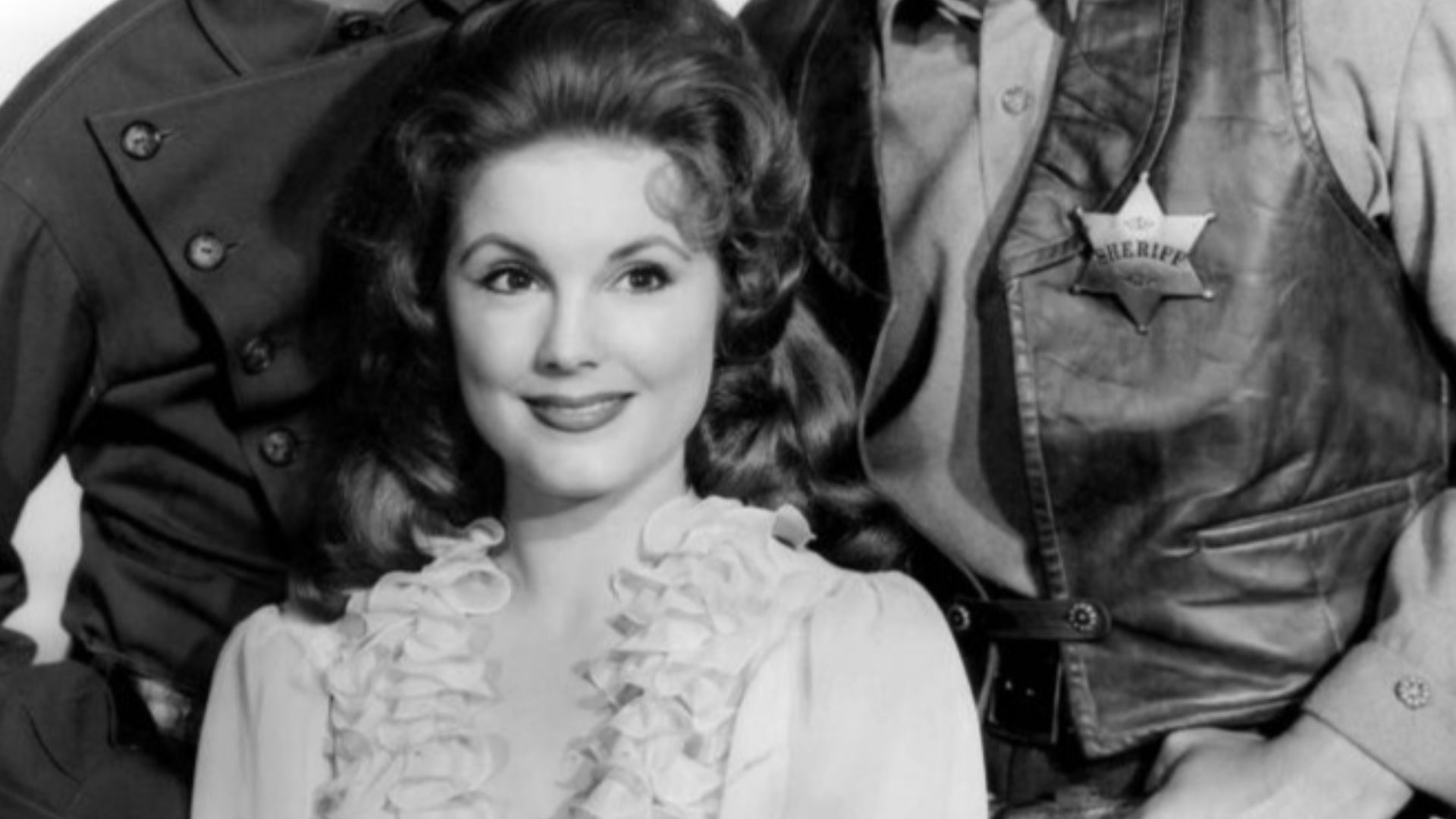 Cast photo from the television program Johnny Ringo. Pictured are Mark Goddard (Deputy Cully), Don Durant (Johnny Ringo) and Karen Sharpe (Laura Thomas).