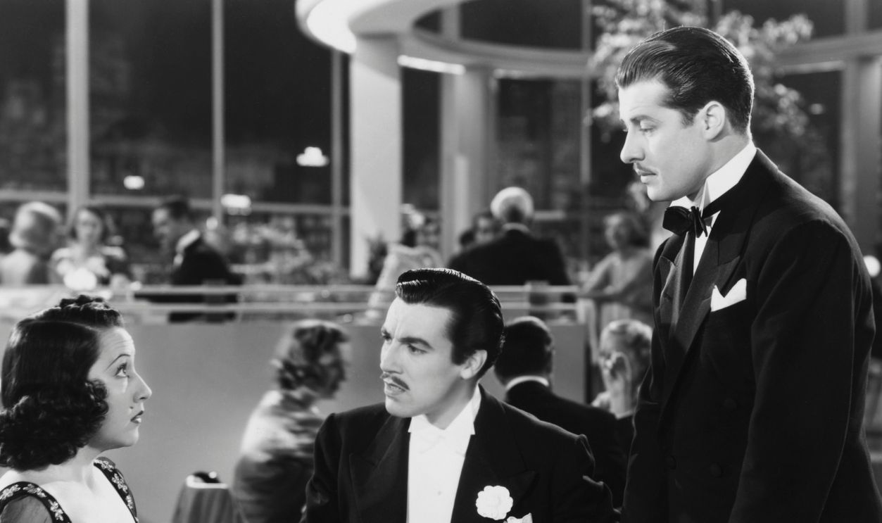 Ethel Merman as Flo Kelly, Cesar Romero as Duke Sargent, and Don Ameche as Jimmy Hall in the 1938 musical comedy Happy Landing