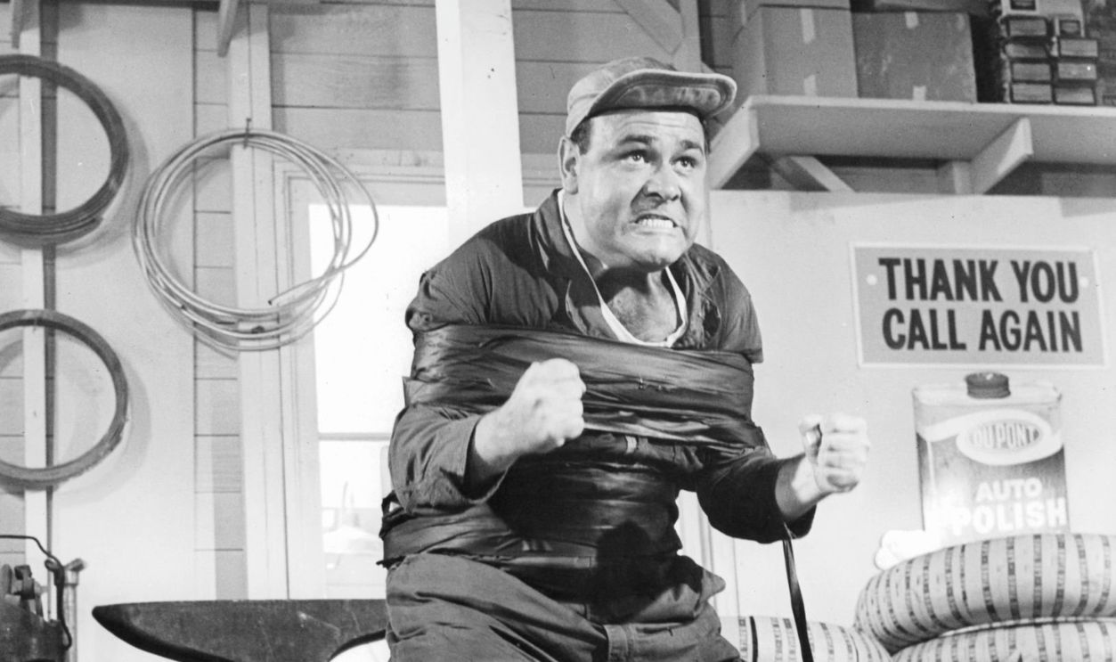 Jonathan Winters bound in tape in a scene from the film 'It's A Mad Mad Mad Mad World', 1963.