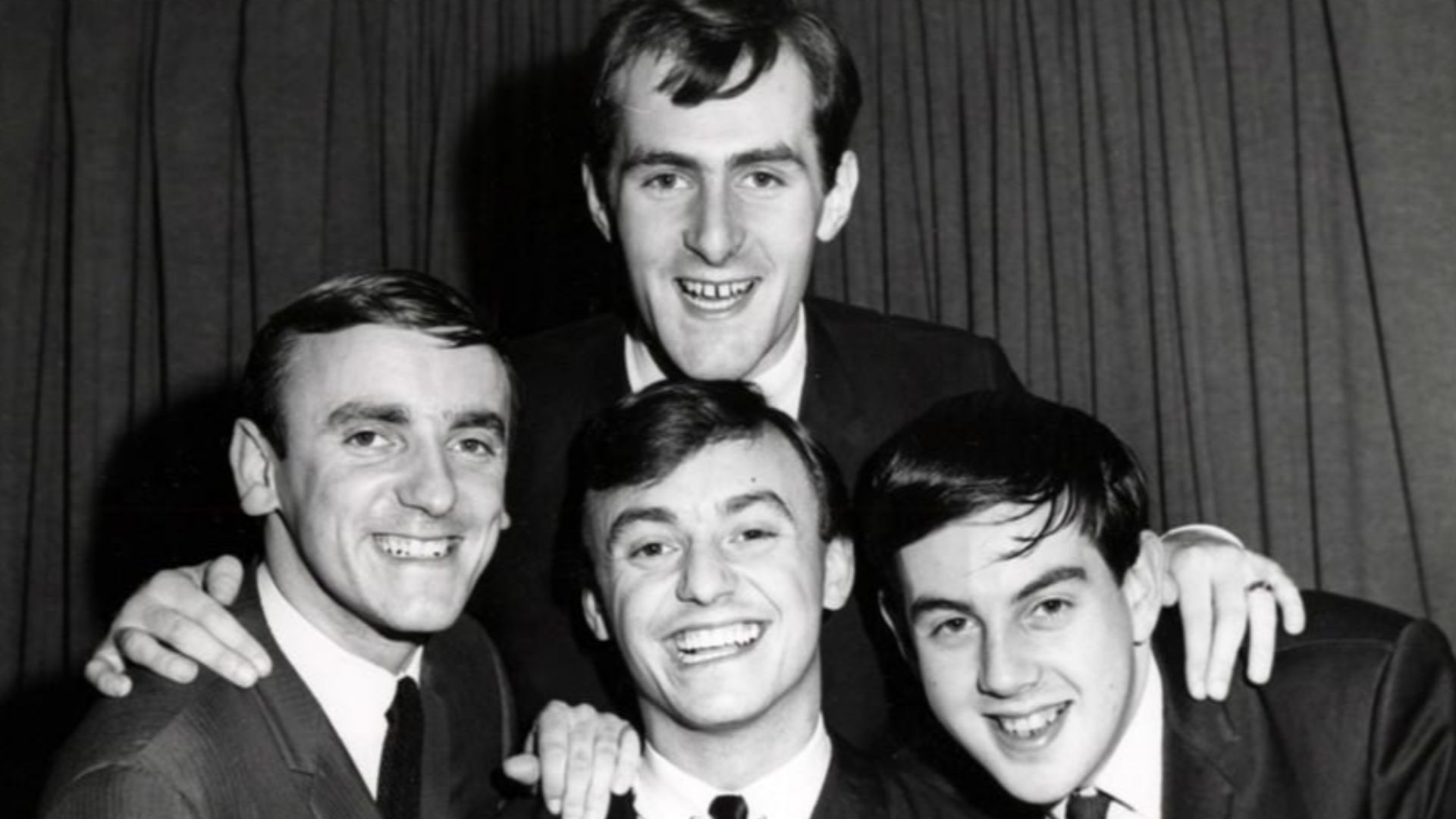 Photo of Gerry and the Pacemakers musical group in 1964 taken by a New York photographer.  
Depicted person:  Les Maguire (top), Freddie Marsden, Gerry Marsden, Les Chadwick

This appears to be their first trip to the United States, likely to appear on Th