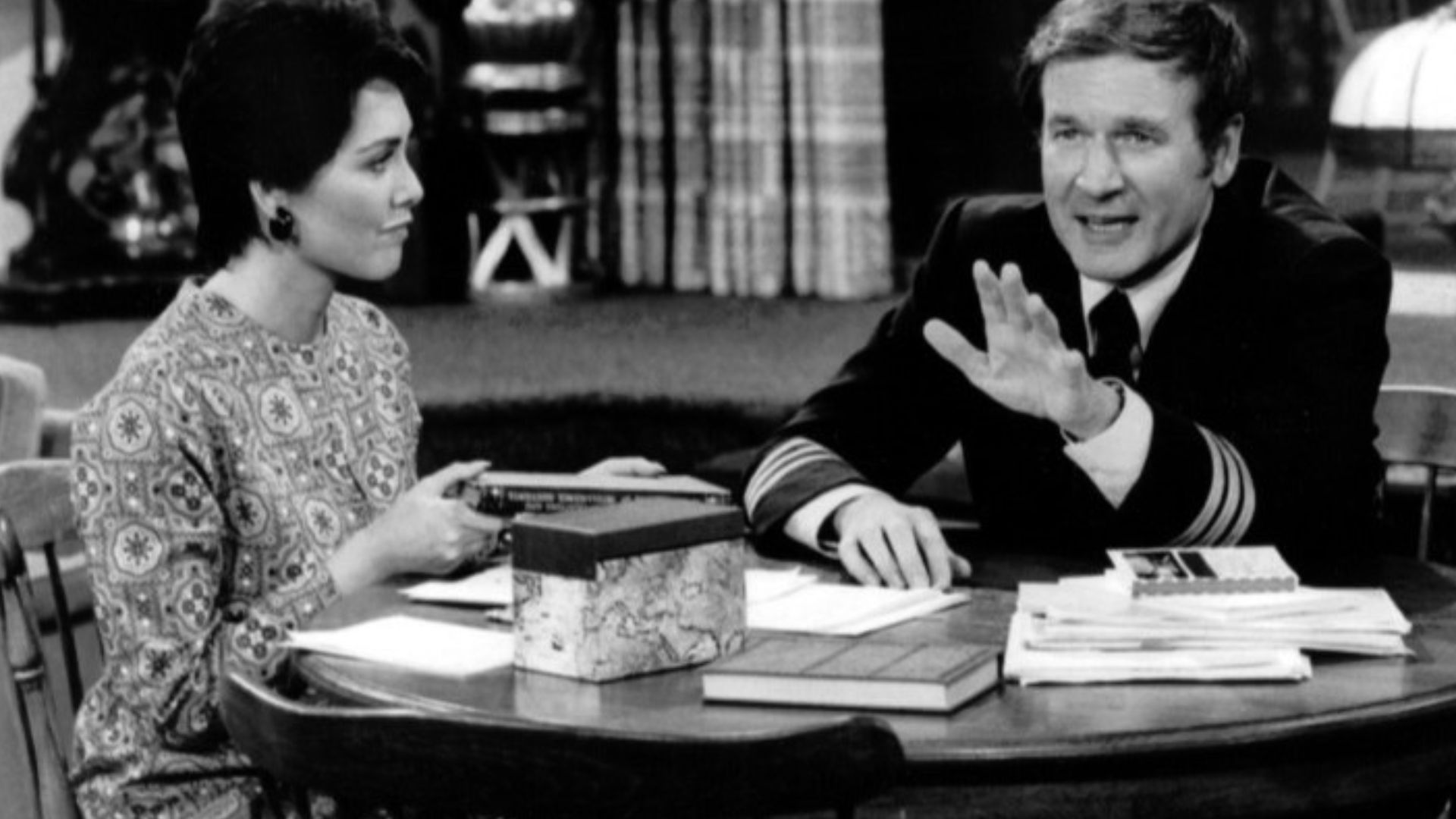 Photo from the television program The Bob Newhart Show.  Emily (Suzanne Pleshette) listens to Howard (Bill Daily).