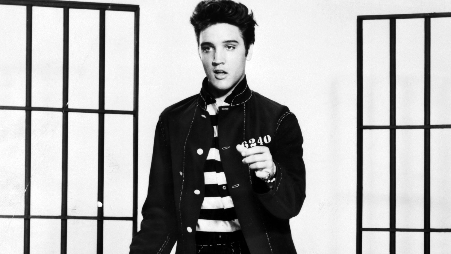 A photograph promoting the film Jailhouse Rock depicts singer Elvis Presley.