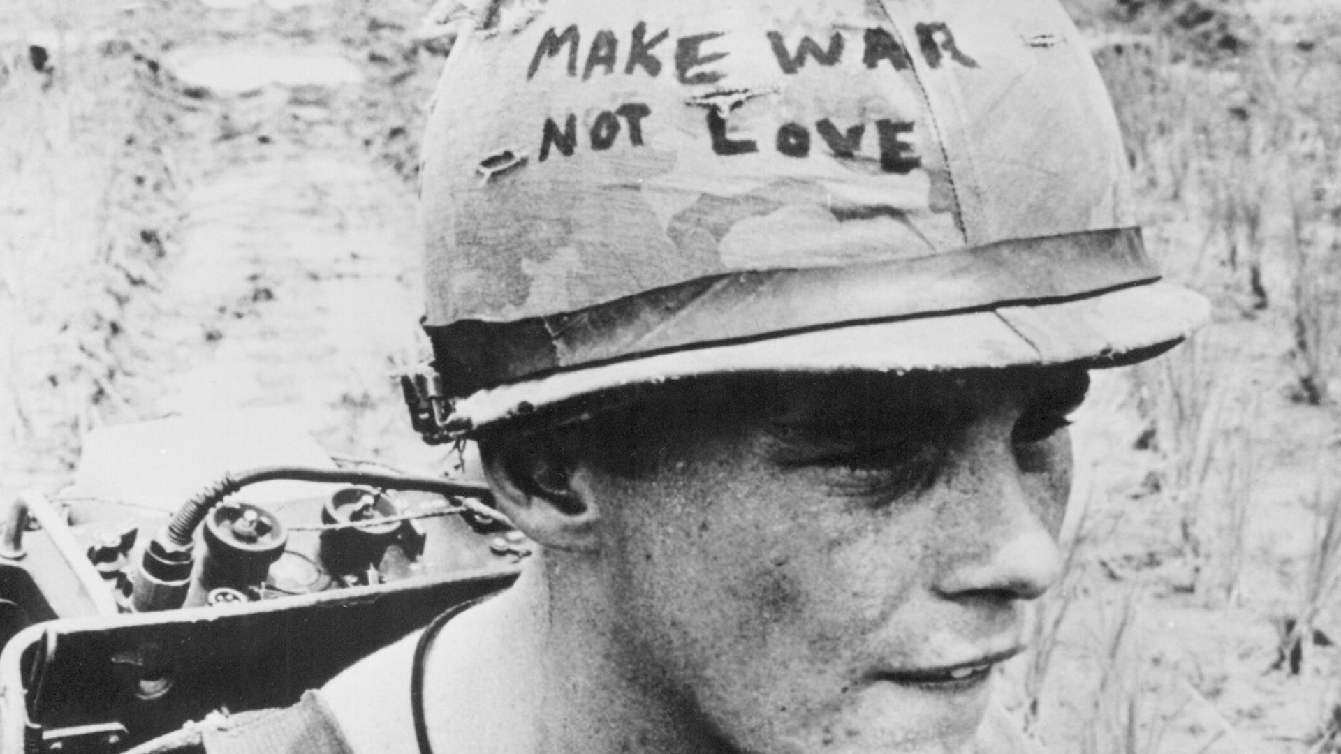 U.S. Marine Cpl. Michael Wynn, 20, of Columbus, Ohio, has a takeoff on a hippie slogan written on his helmet -