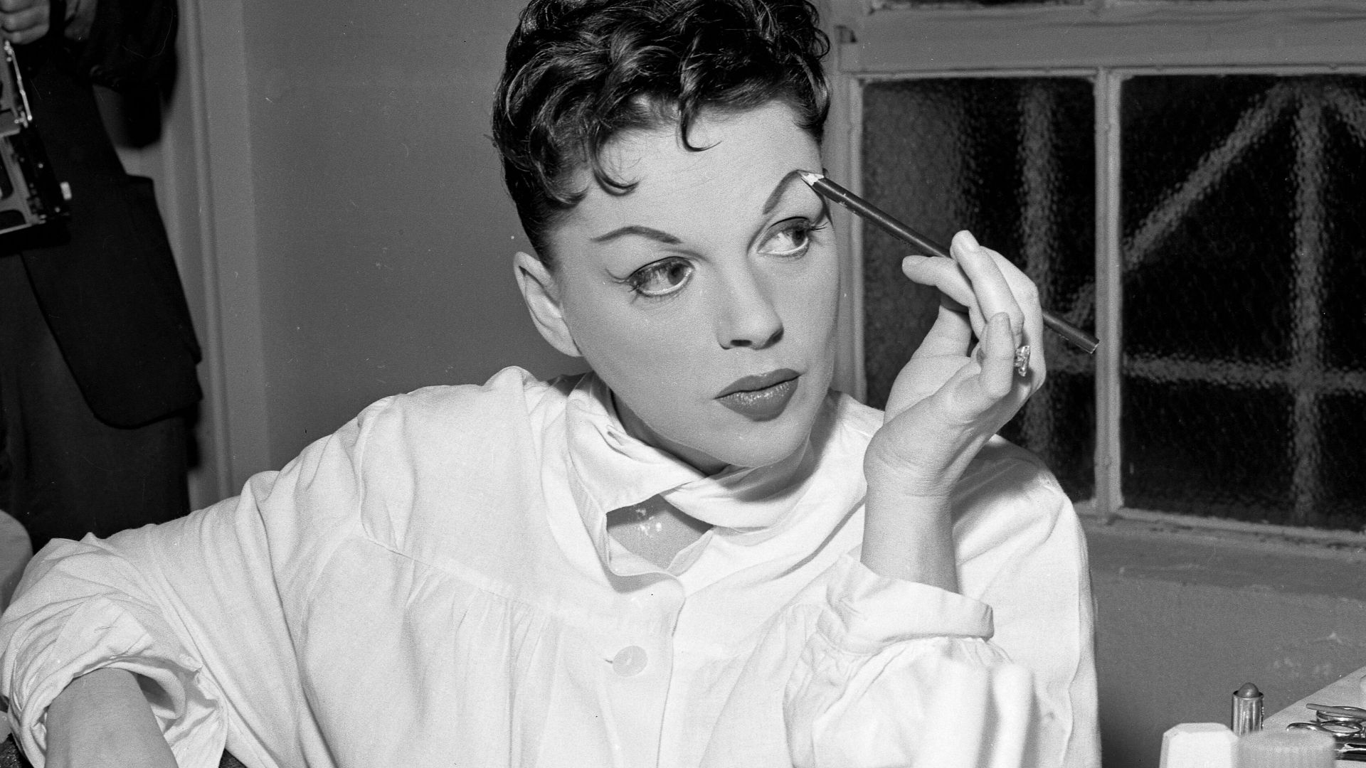 Singer Judy Garland in her dressing room at the Greek Theater.