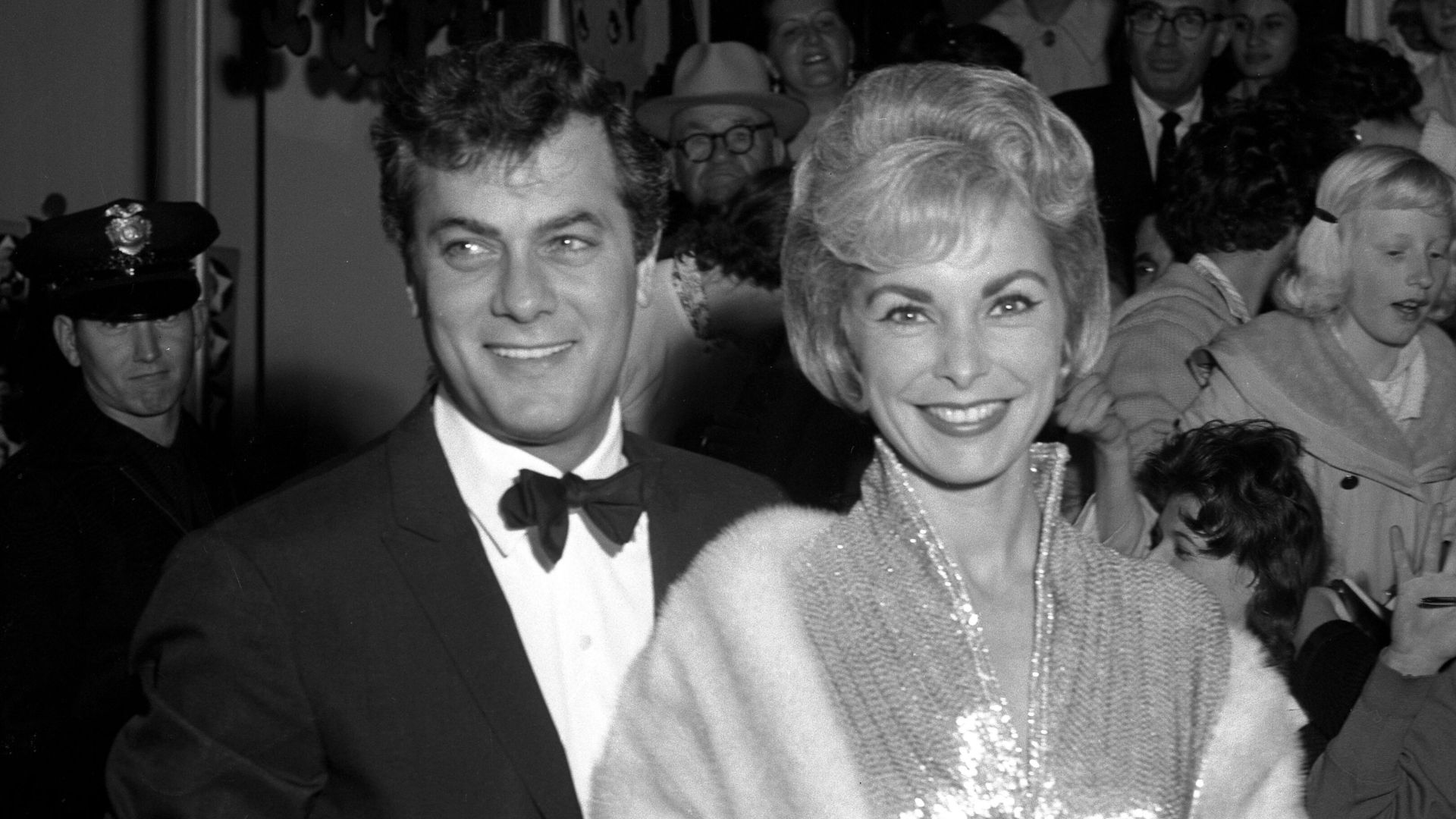 Actors Tony Curtis and Janet Leigh with fans at film premiere of Pepe in Los Angeles