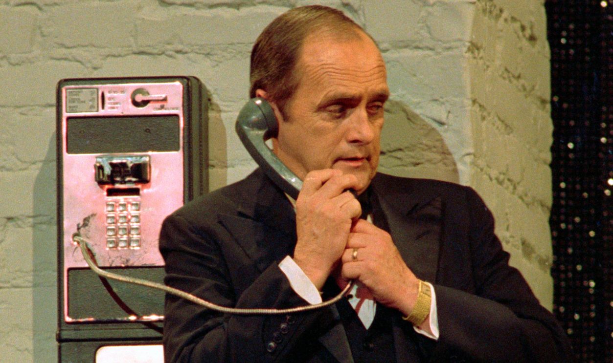  Bob Newhart talks on a pay telephone during 'Hollywood 100th Birthday' celebration, April 26, 1987 in Hollywood section of Los Angeles, California