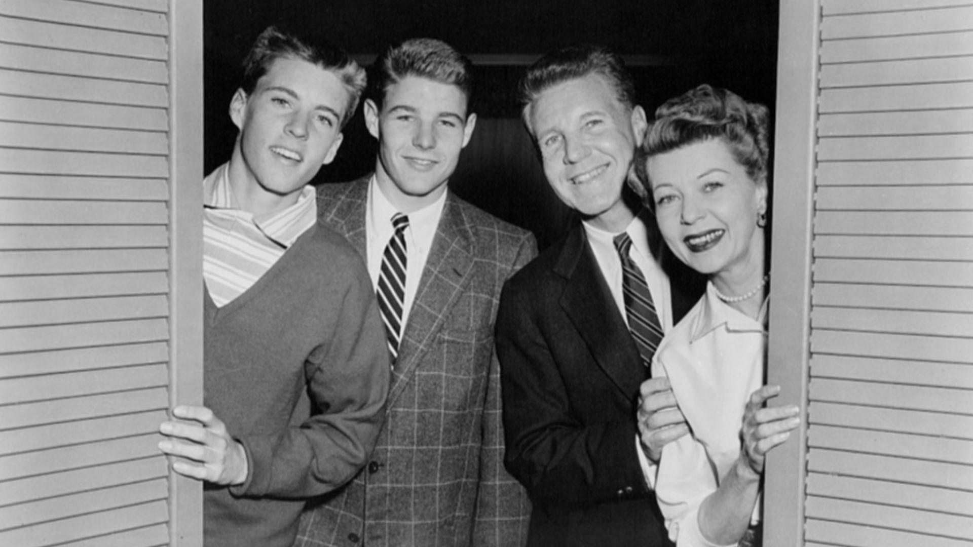 Publicity photo of American actors, (L–R) Ricky Nelson, David Nelson, Ozzie Nelson and Harriet Nelson promoting their roles on the ABC television series The Adventures of Ozzie and Harriet, circa 1956.