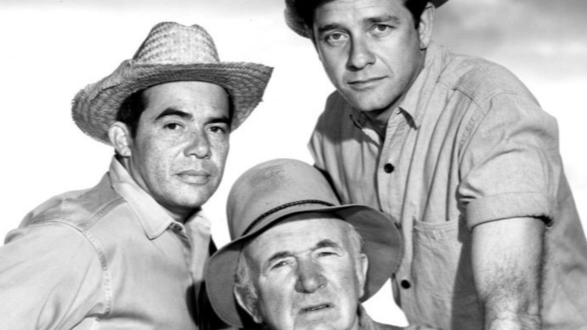 Photo from the television program The Real McCoys.  Standing, from left: Anthony Martinez (Pepino) and Richard Crenna (Luke McCoy). Seated: Walter Brennan (Grandpa Amos McCoy).