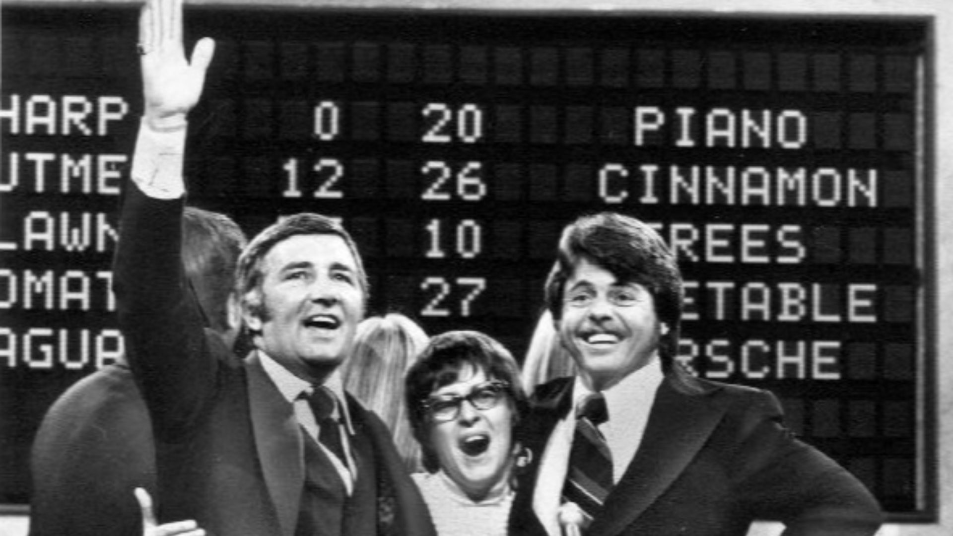 Photo of Richard Dawson and contestants from the television game show Family Feud.