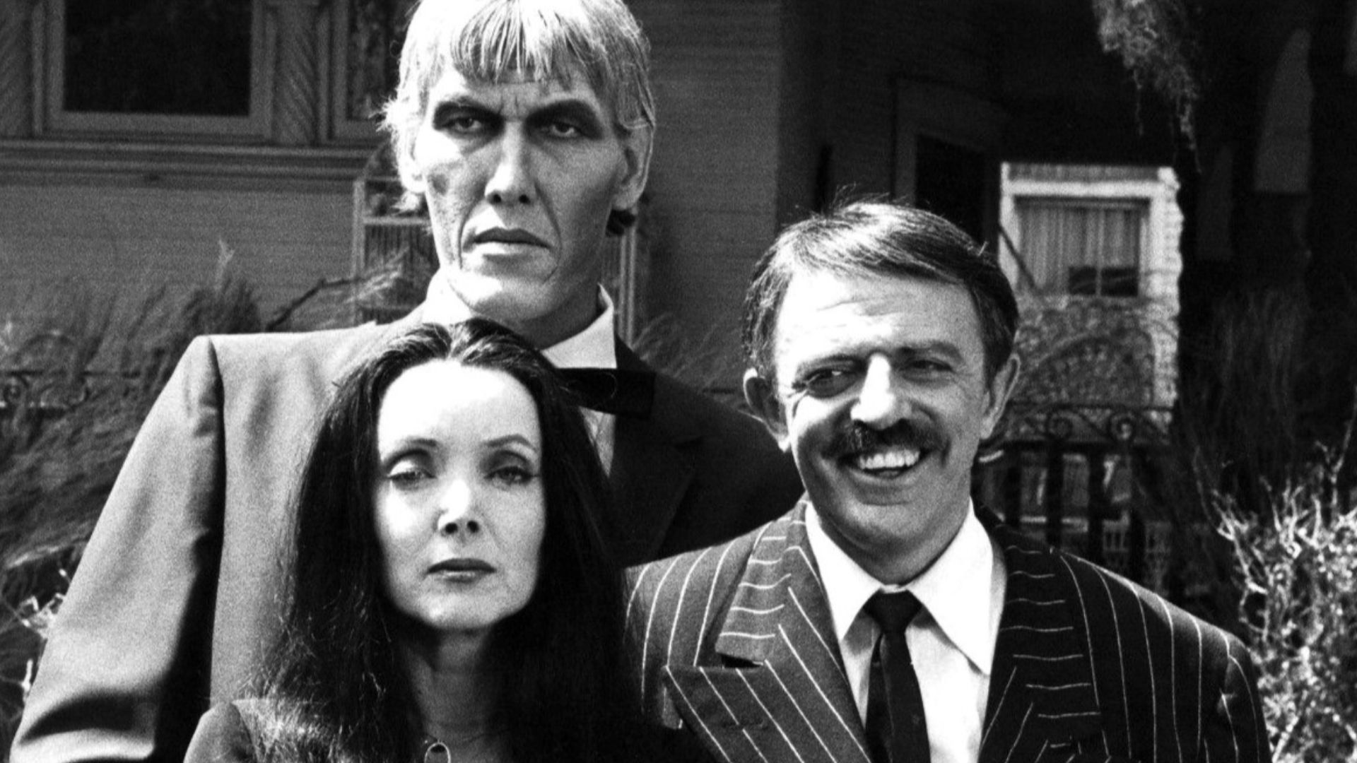 Photo of the main cast of the television program The Addams Family.  From left-Ted Cassidy (Lurch), Carolyn Jones (Morticia) and John Astin (Gomez).  In 1977, NBC reunited the original cast of the series for a Halloween Big Event Special.  This photo is f