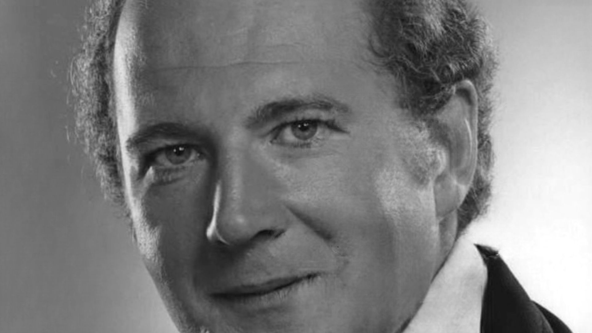 David Ogden Stiers portrays Stanley Moss, the