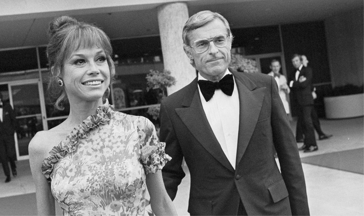 Actress Mary Tyler Moore arrives for the 25th Annual Emmy Awards with her husband Grant Tinker.