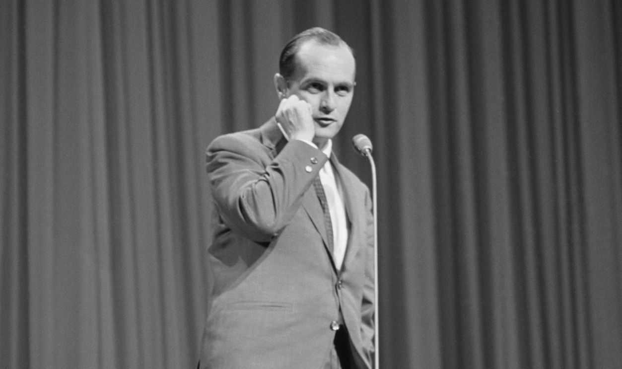 American comedian and actor Bob Newhart pictured on stage performing in the Royal Variety Performance at the Palladium in London on 2nd November 1964. 