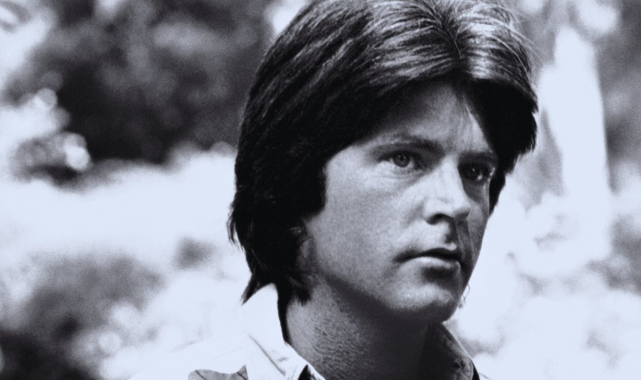 Portrait of American musician & actor Ricky Nelson (1940 - 1985) as he stands with his hands on his hips, Los Angeles, California, 1973.