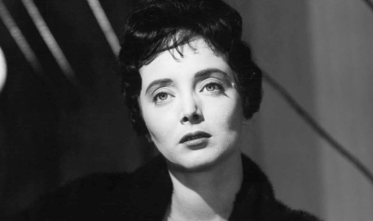 Carolyn Jones sitting in a scene from the film 'Career', 1959.