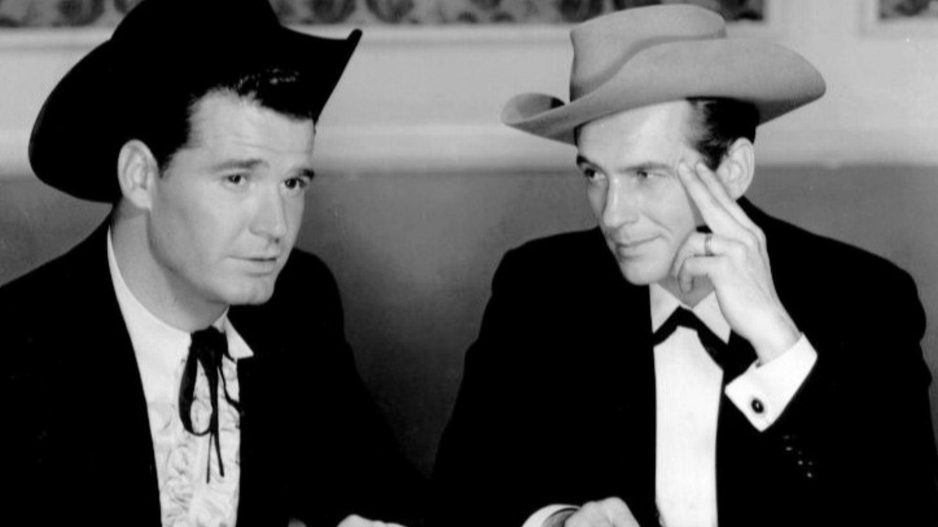 Photo of James Garner as Bret Maverick and Jack Kelly as Bart Maverick.  The episode, titled