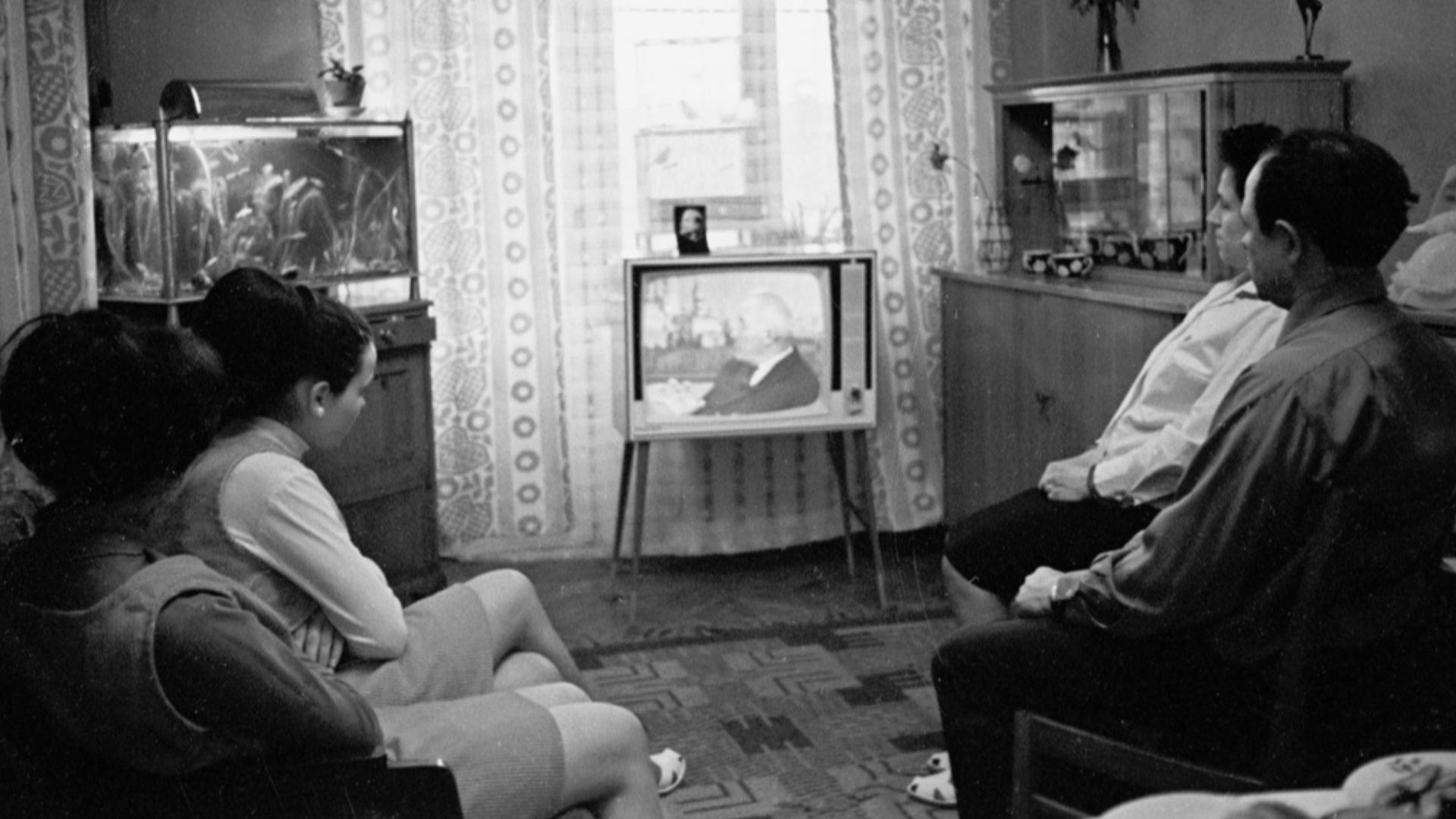 “The Borshagin's at home”. The Borshagin's, workers of Weaving Factory named after Yakov Sverdlov, having rest watching TV at home.