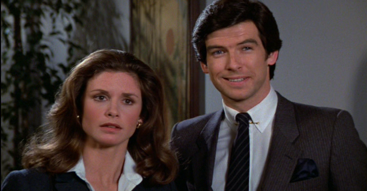 Screenshot of actors Stephanie Zimbalist and Pierce Brosnan in NBC’s Remington Steele (1982-1987)