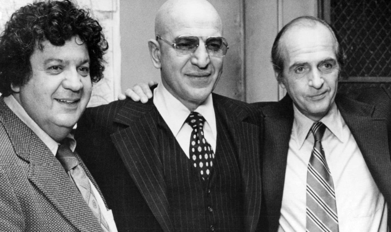 Left to right: George Savalas (1924 - 1985), as Sergeant Stavros, Telly Savalas (1922 - 1994), as Detective Lieutenant Theo Kojak, Dan Frazer (1921 - 2011) as Captain Frank McNeil and Mark Russell as Detective Percy Saperstein, in a promotional portrait for the TV crime series 'Kojak', circa 1975. 